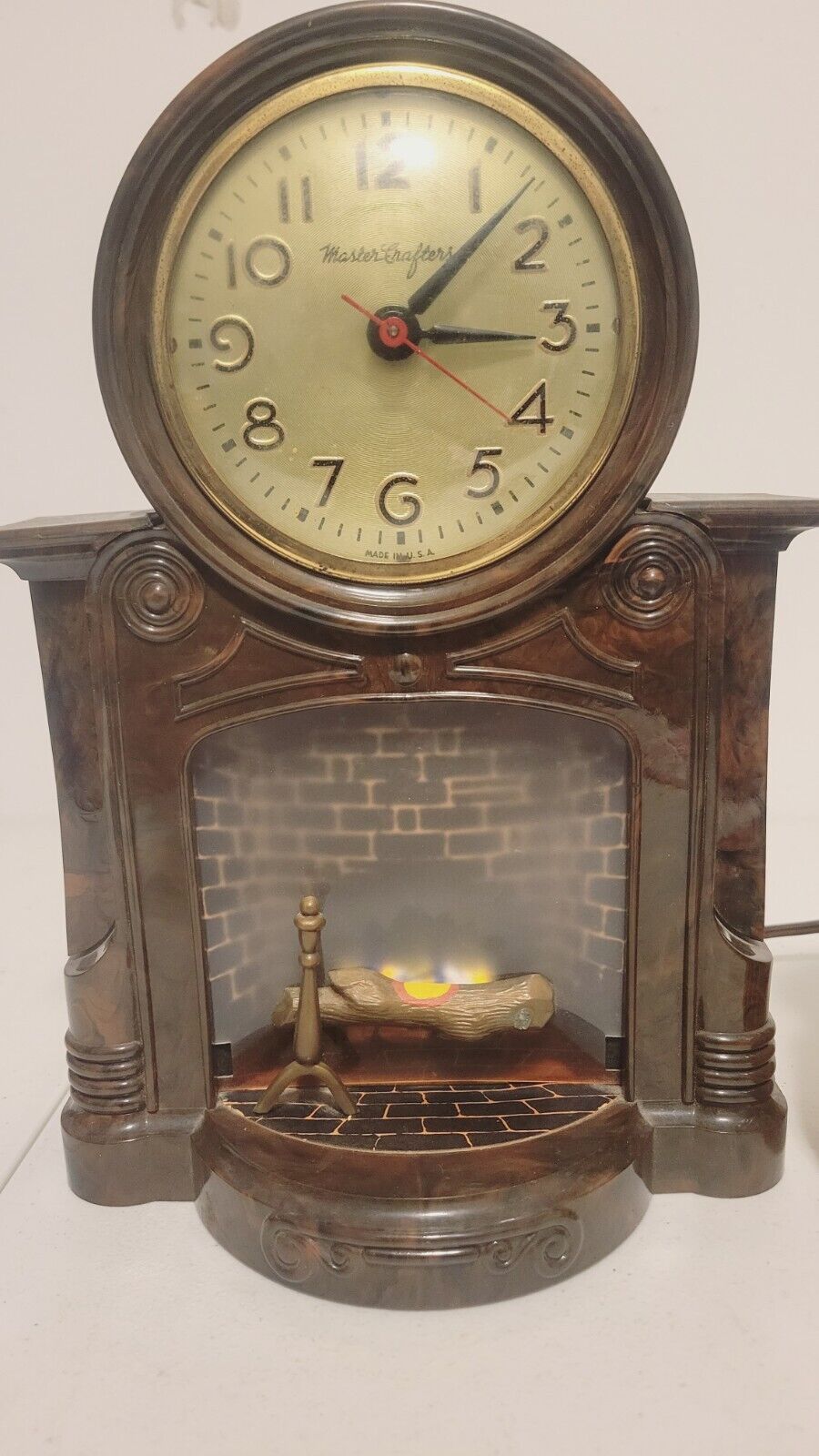 MasterCrafters Model 272clock Works. Fireplace Light Needs Replaced. Made In USA