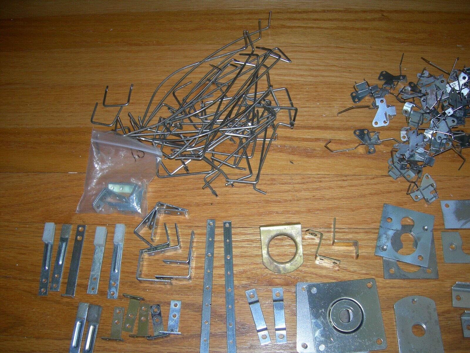 A Parts lot of misc. Metal cabinet and playfield parts. Mostly Early Bally