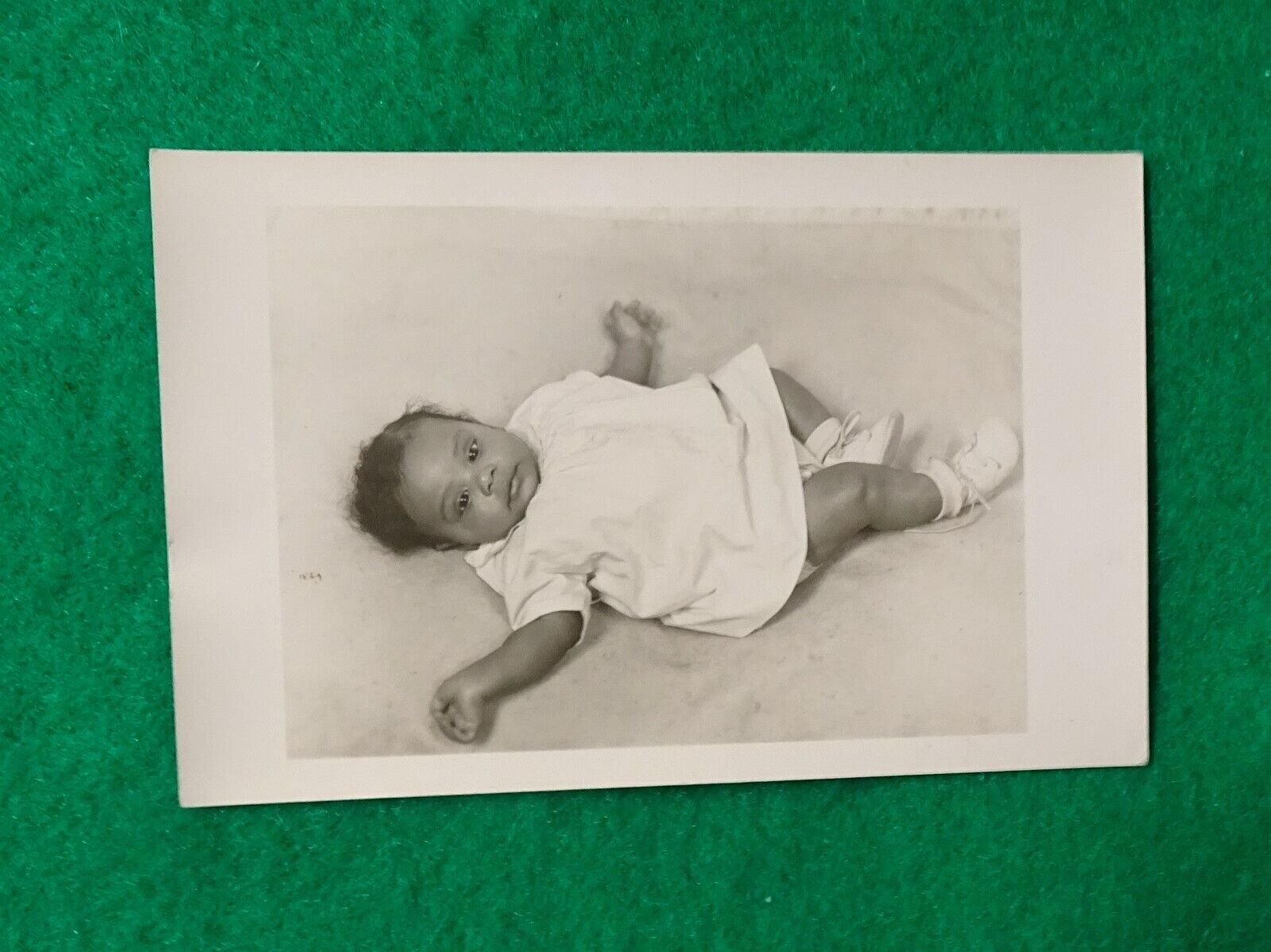 Vintage Antique photo postcard of a young African American Baby