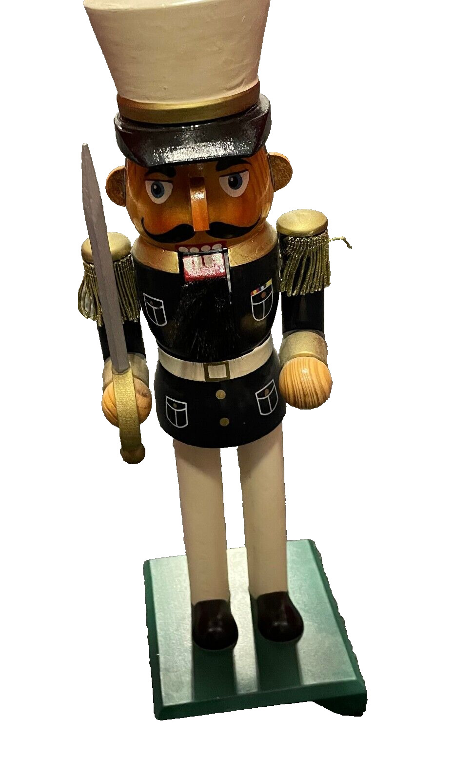 Nutcracker soldier sergeant arms statue carrying swords