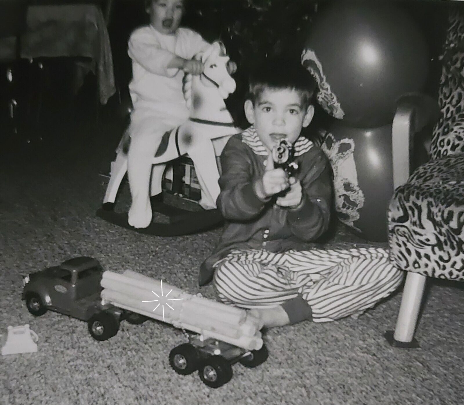 Vtg snapshot photo: Boy Holding Toy Cap Gun Pistol, 1957 Christmas Toys Truck L1