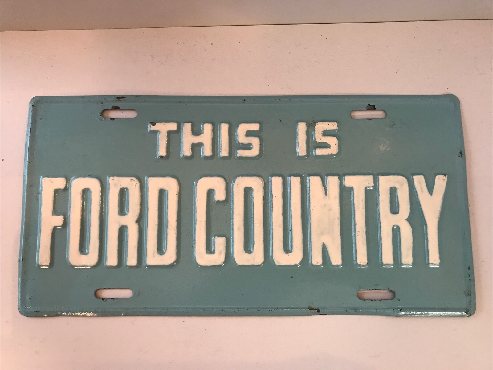 1960\'s THIS IS FORD COUNTRY BOOSTER ORIGINAL License Plate Steel
