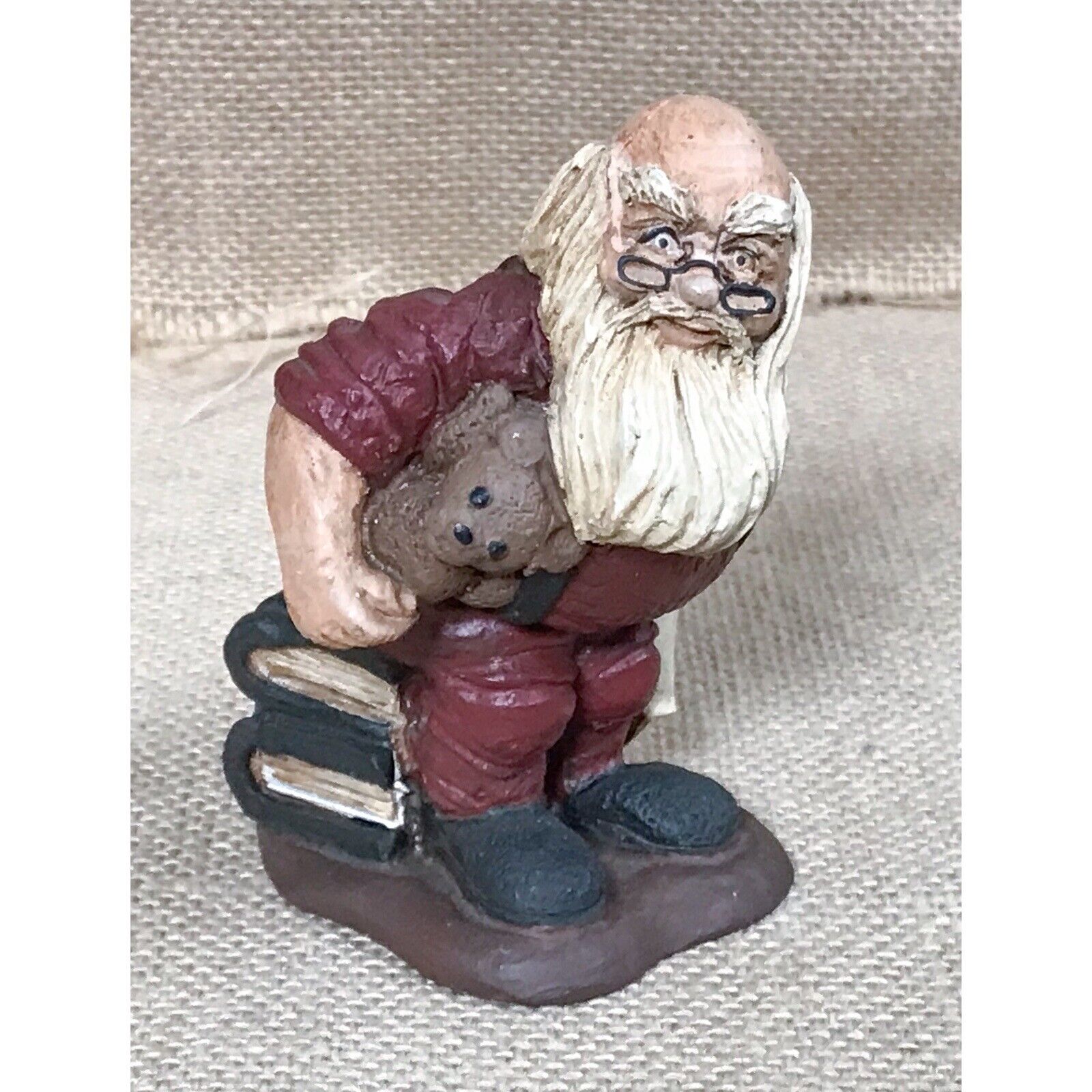 Rustic Primitive Christmas Resin Santa Claus Sitting On Books Figurine Holiday