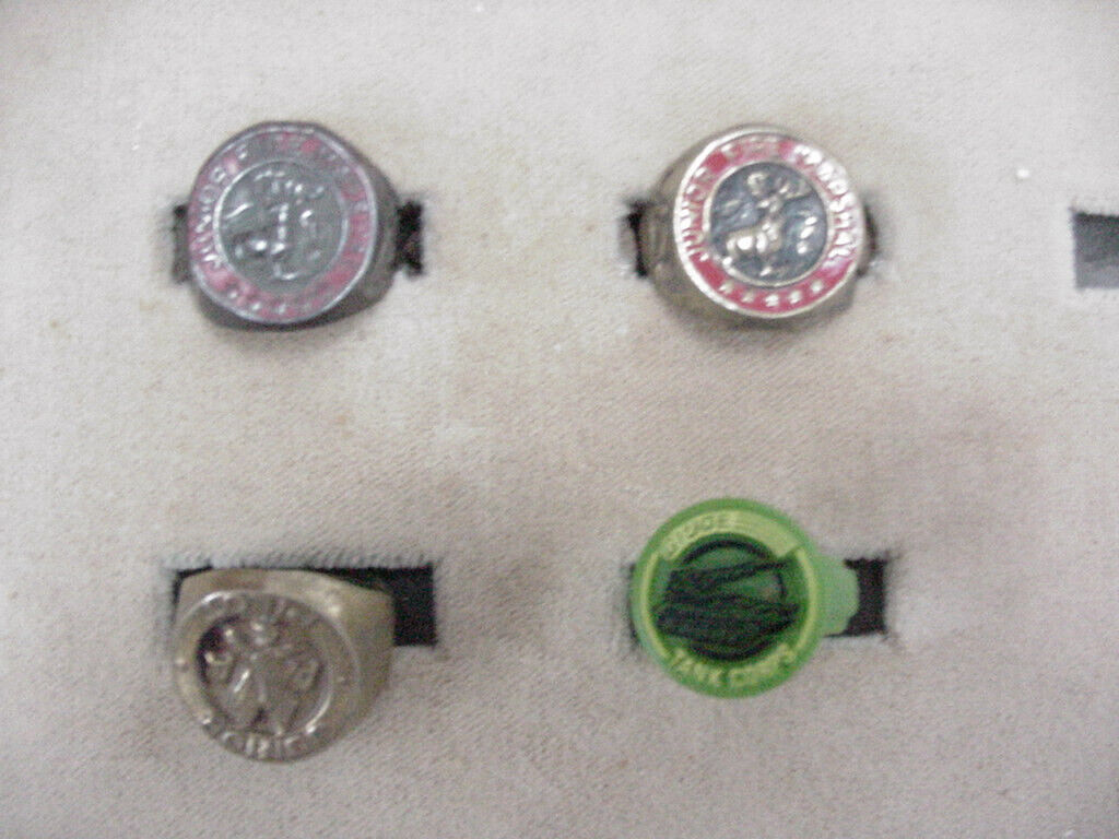 LOT OF FOUR VINTAGE PREMIUM RINGS. MIXED SUBJECTS SEE PHOTOS