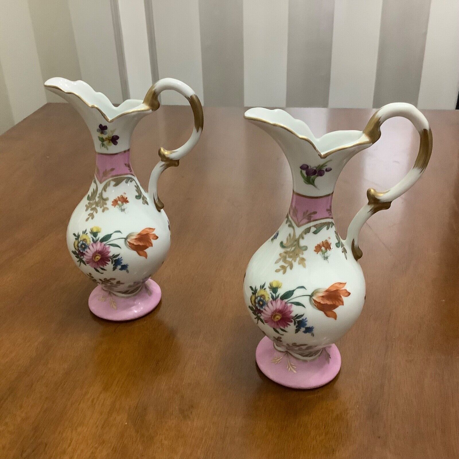 Two decorative floral pitchers, Heirloom by Toyo