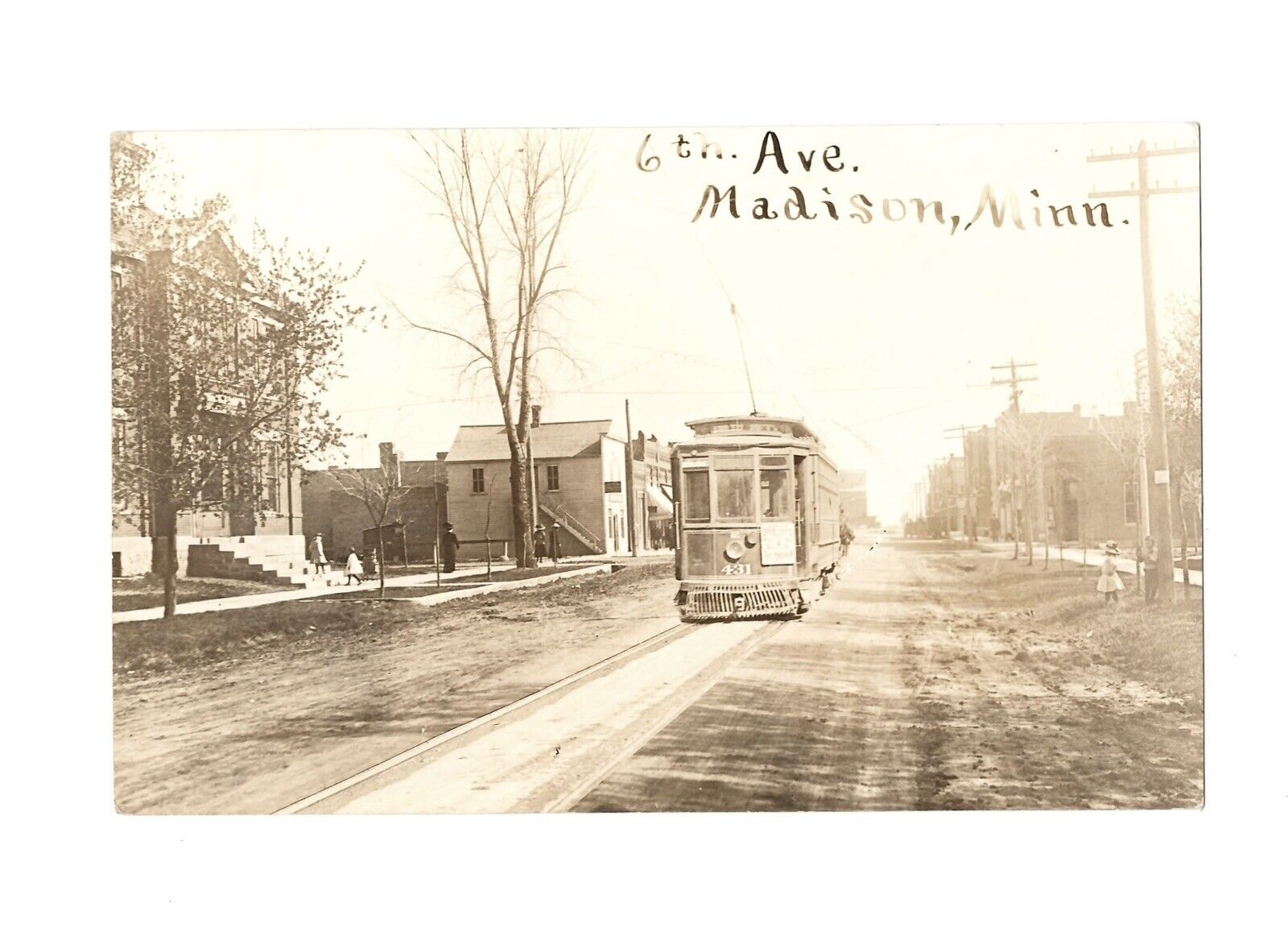 RPPC 6th Avenue MADISON MN Minnesota Real Photo Postcard Street View 1911