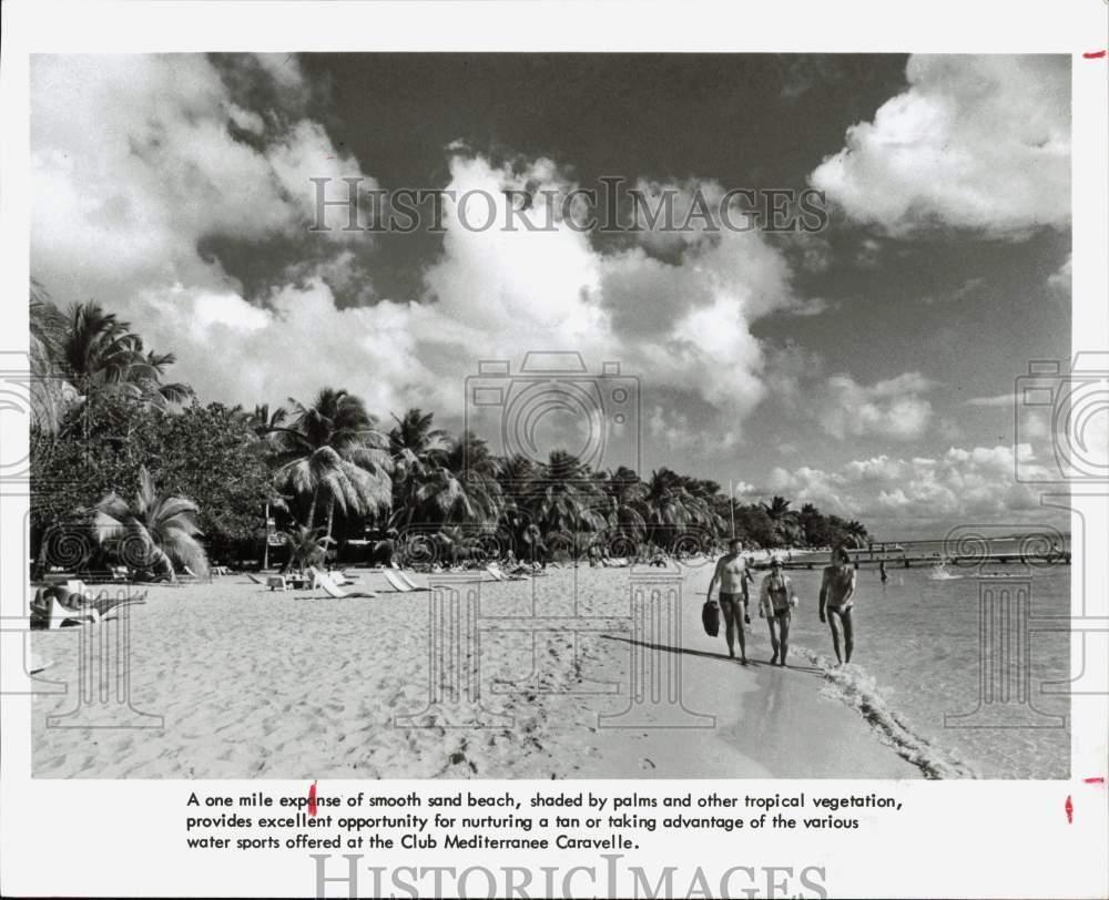 1979 Press Photo People walk along beach in Guadeloupe - hpw05380