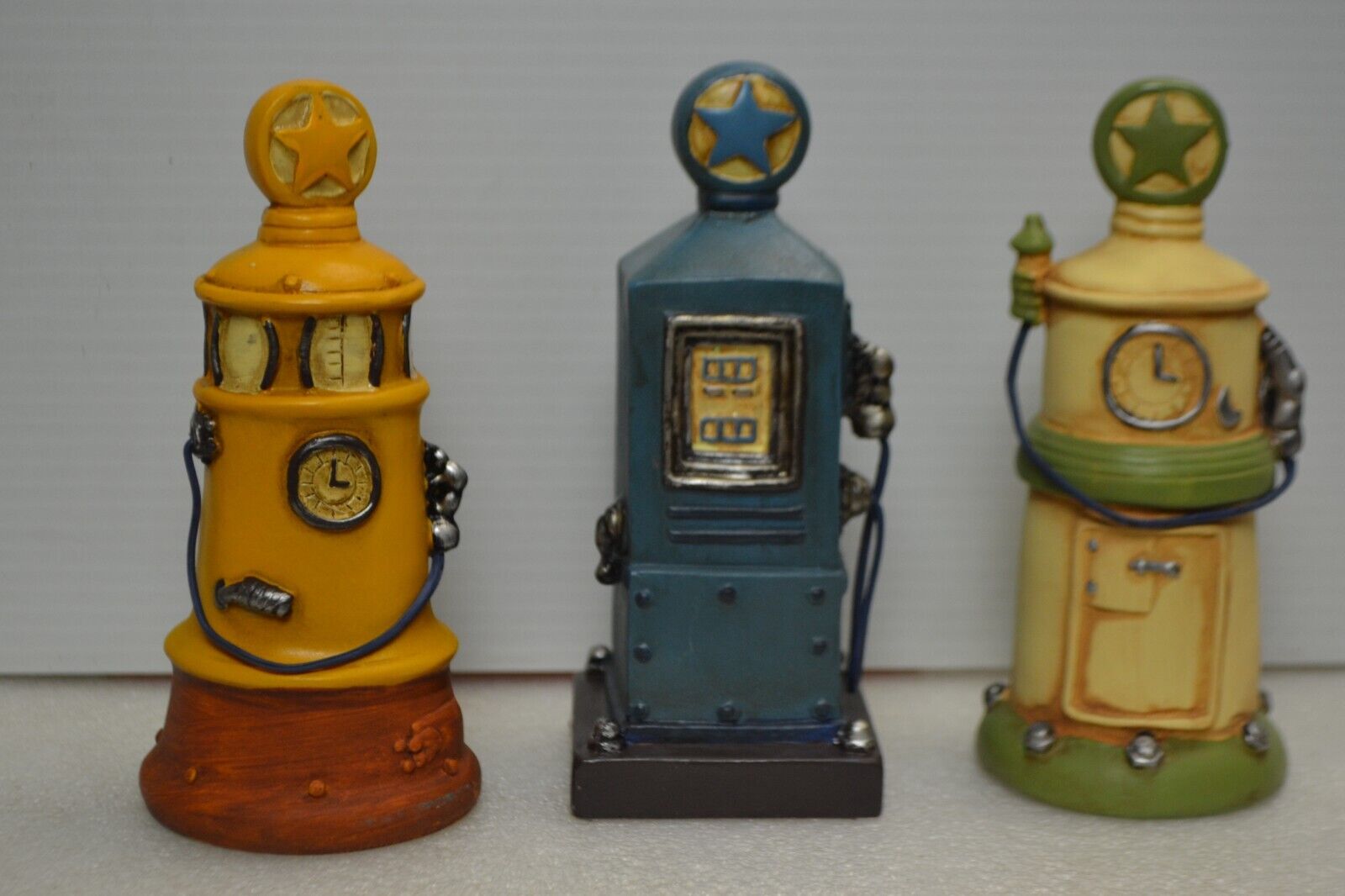 Old gas pump figurines set of three 5\