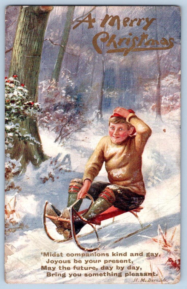 1910 MERRY CHRISTMAS TUCK'S OILETTE BOY ON SLED BURNSIDE POEM ANTIQUE POSTCARD