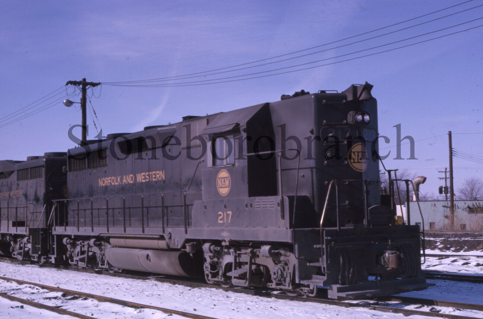 H.) Original RR slide: N&W GP35 #217 winter scene @ Detroit MI; 2/1966