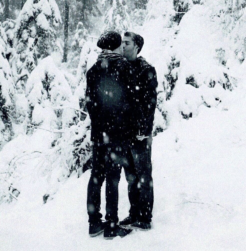Two young men kissing in the snow 2000s gay man's collection 4x4