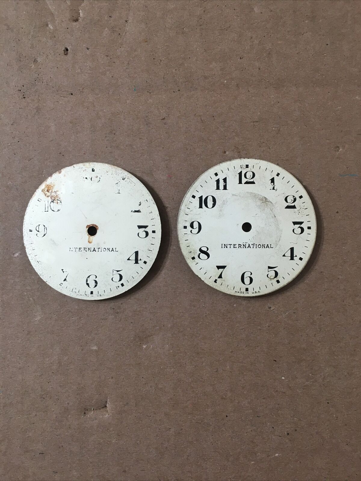Two Antique International Watchman’s Clock Dial Parts
