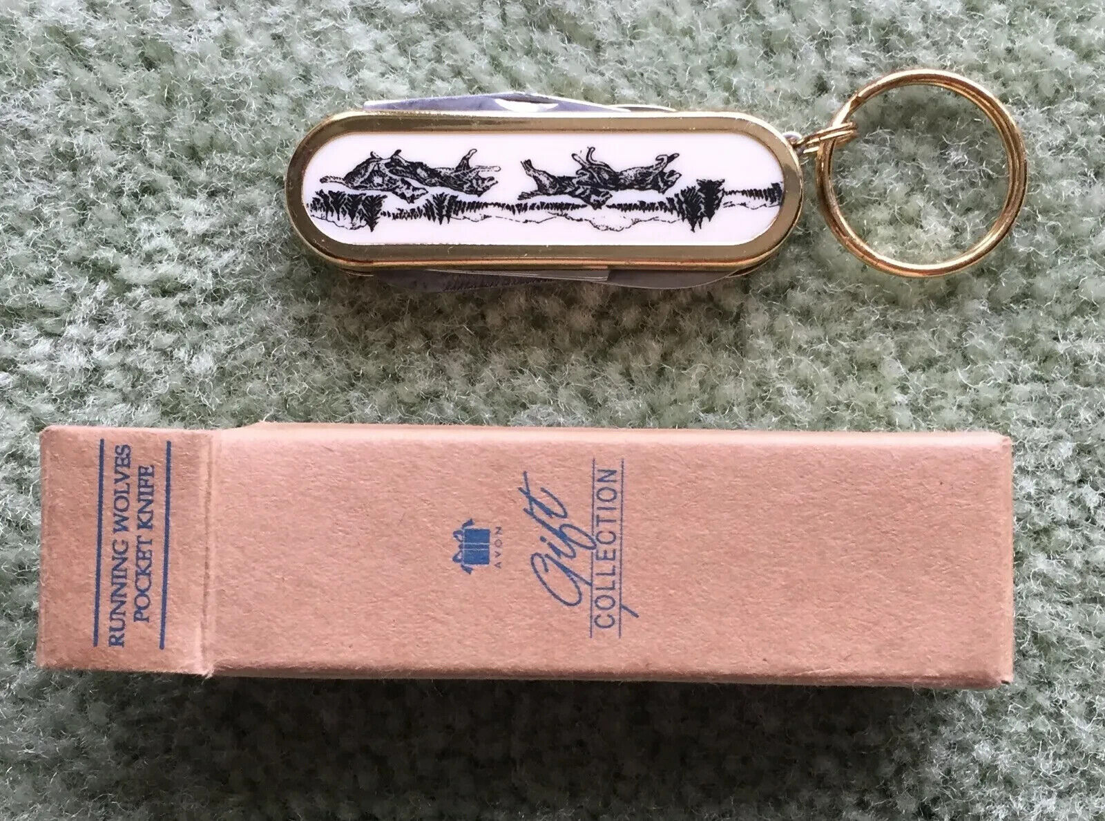 Vintage Avon Running Wolves Pocket Knife Keychain With 4 Tools, 1999