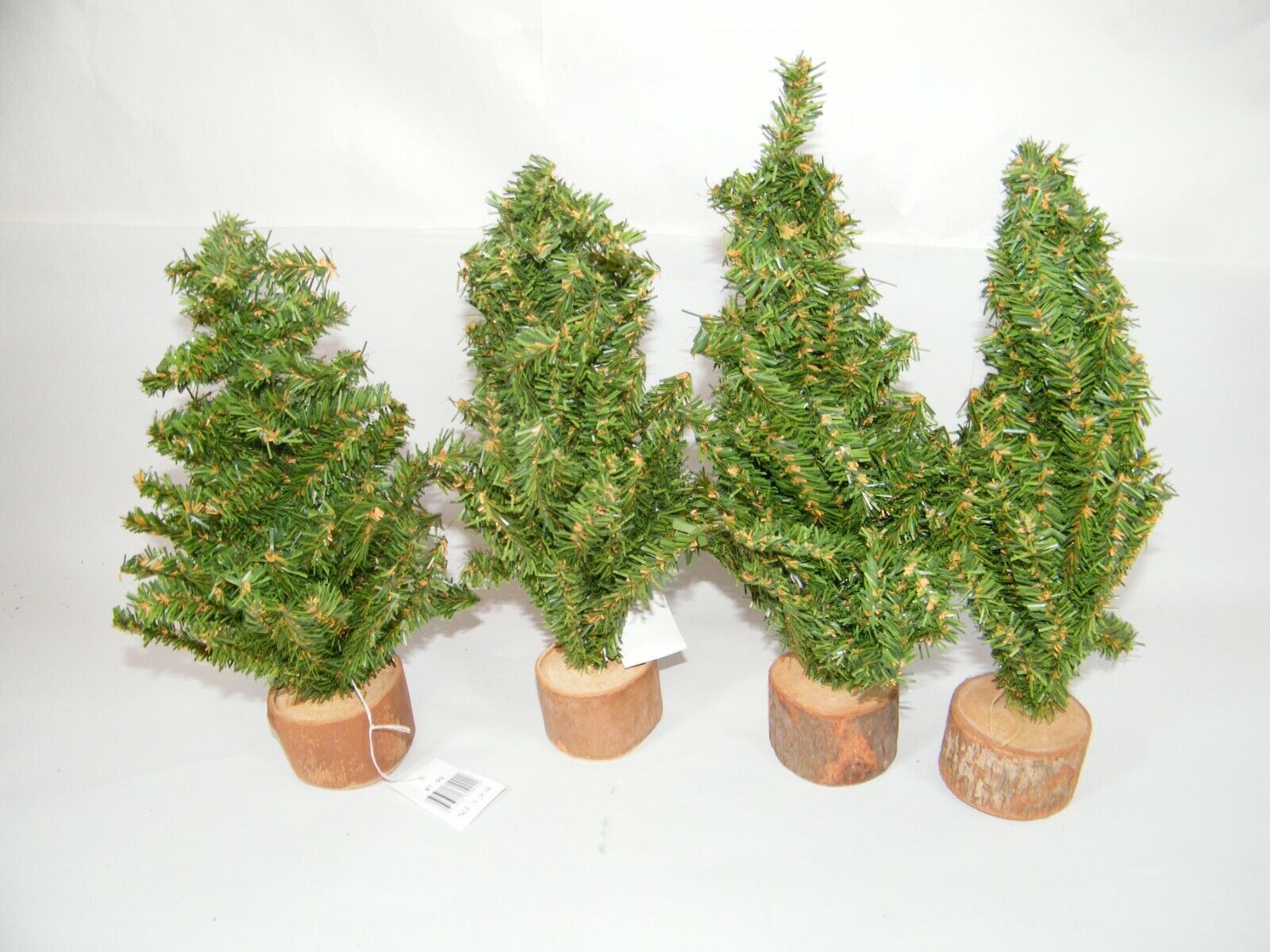 (4) MINIATURE CHRISTMAS TREES WOOD BASES 12