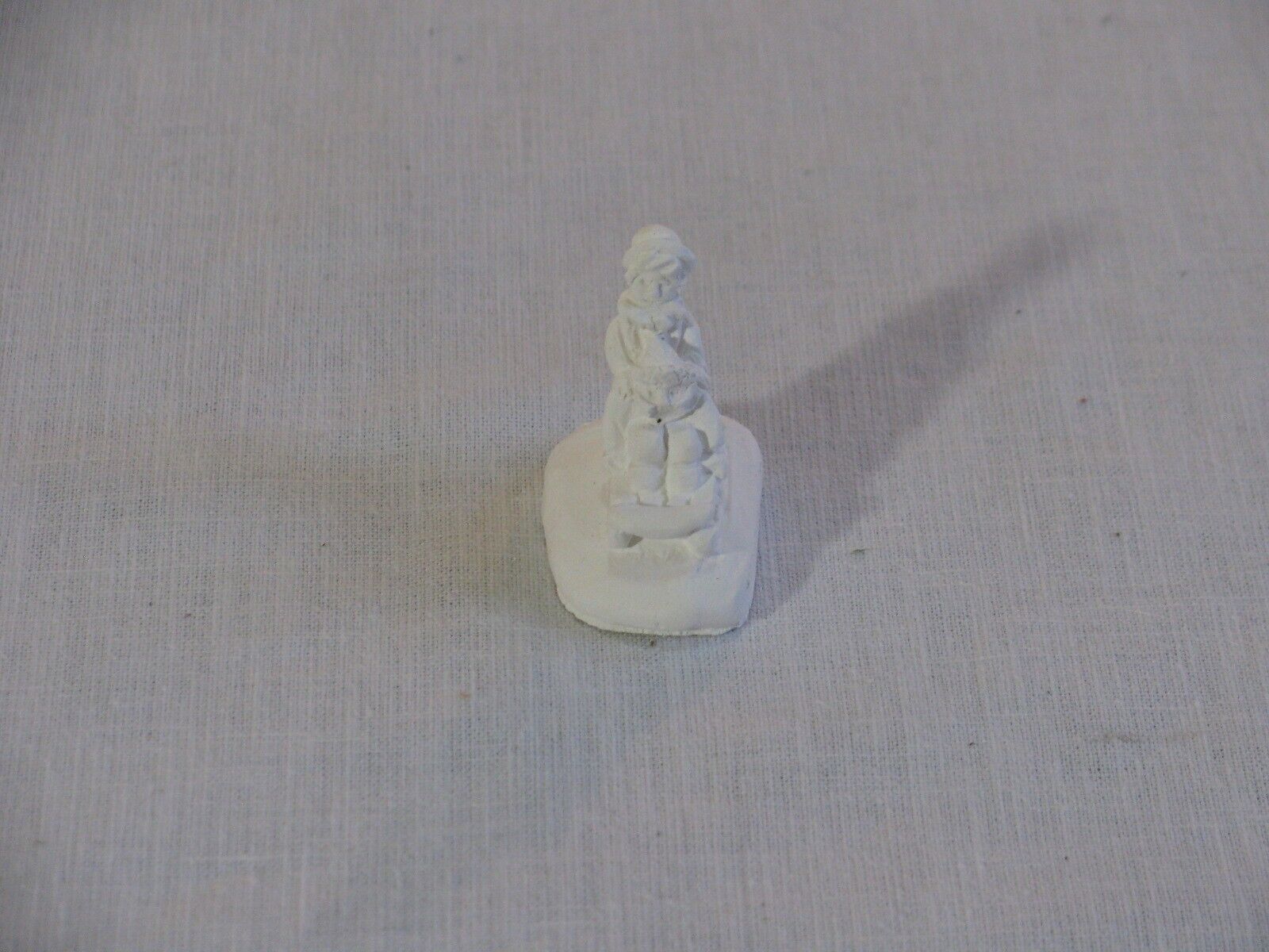 Vtg Mini Unpainted Paintable Ceramic Boy/Girl Sledding Figurine, Unmarked