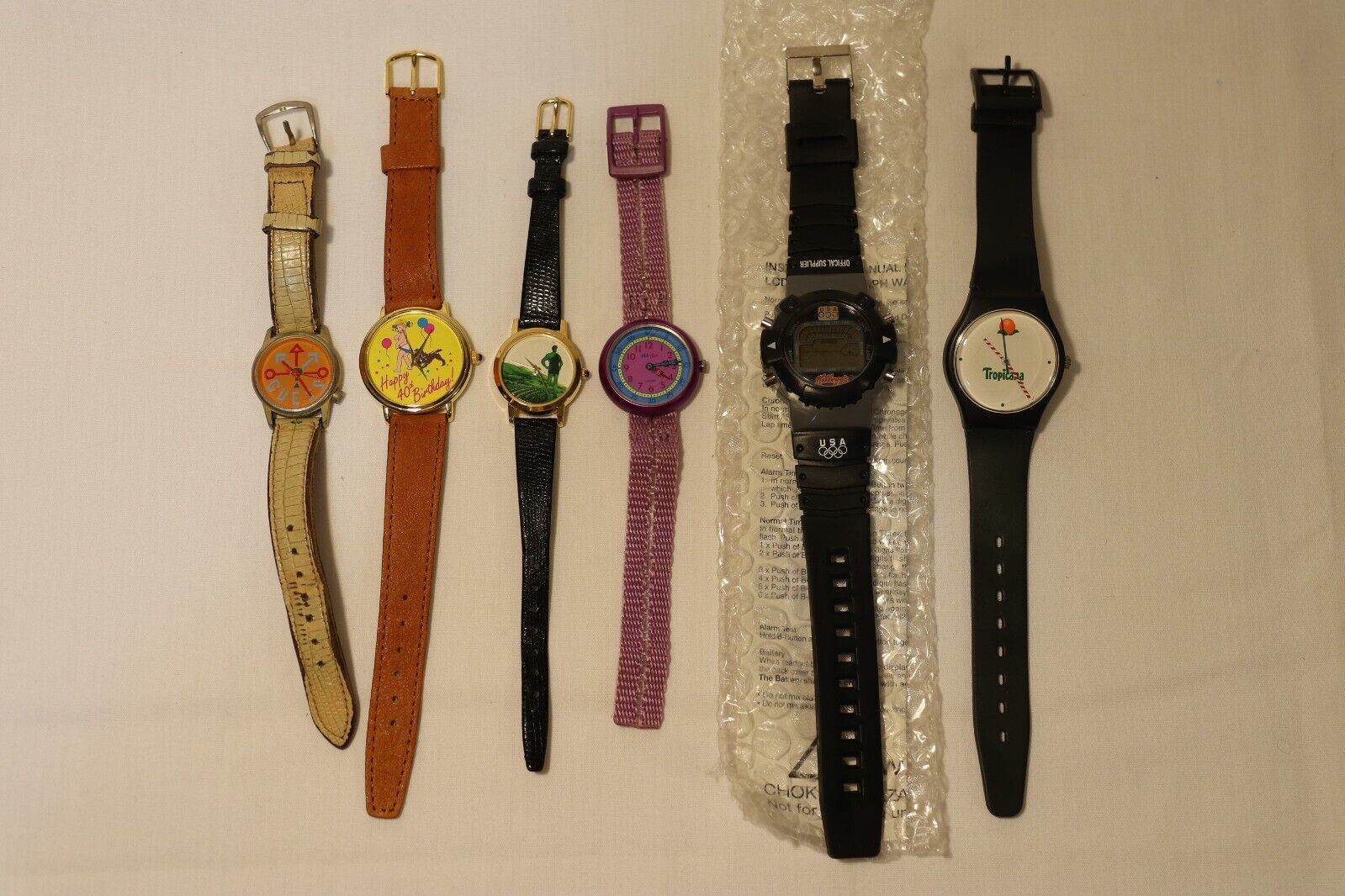 Collection of 6 different advertising watches.