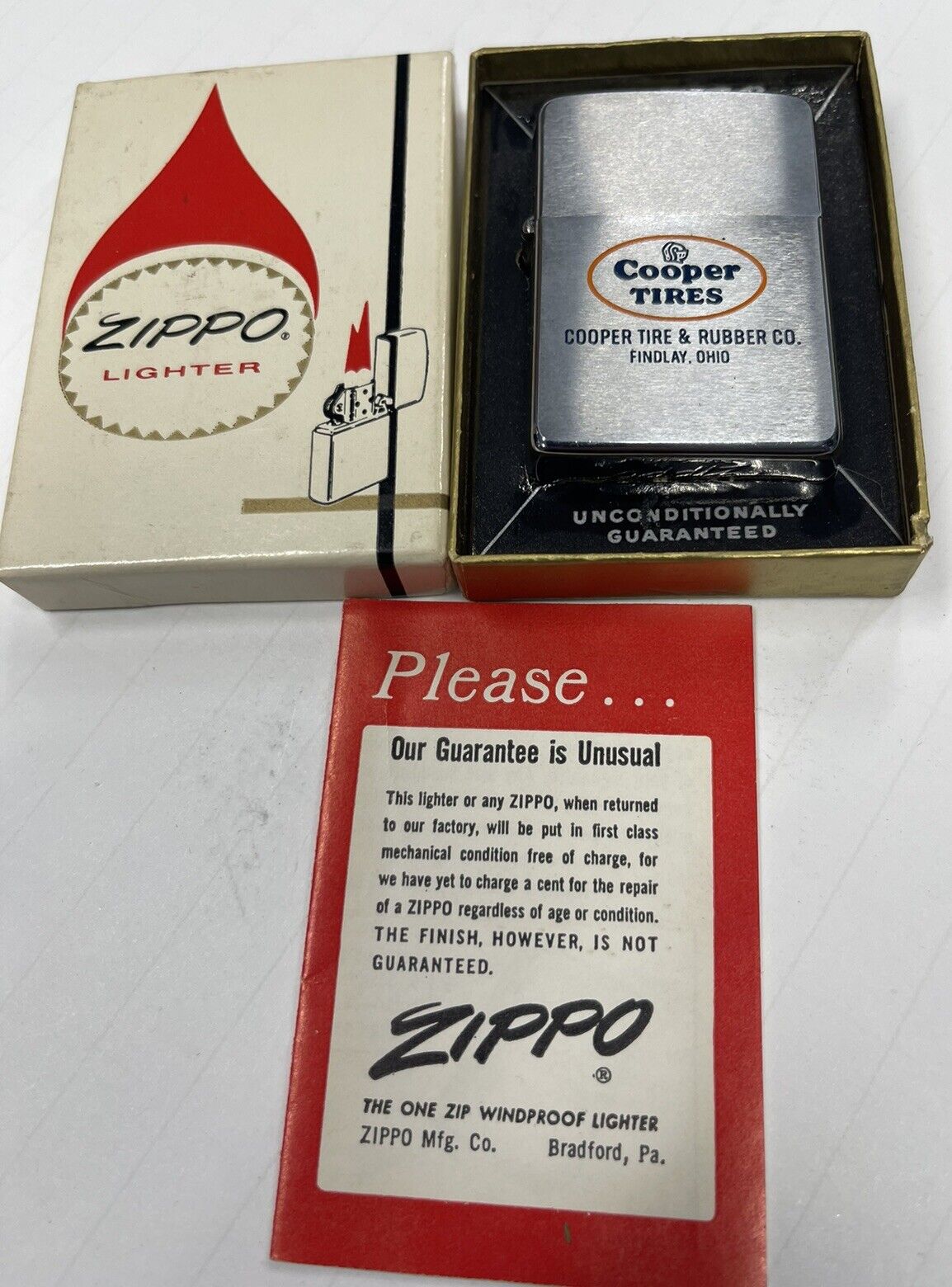 ZIPPO 1964 COOPER TIRES FINDLAY OHIO ADVERTISING LIGHTER UNFIRED IN BOX Q1