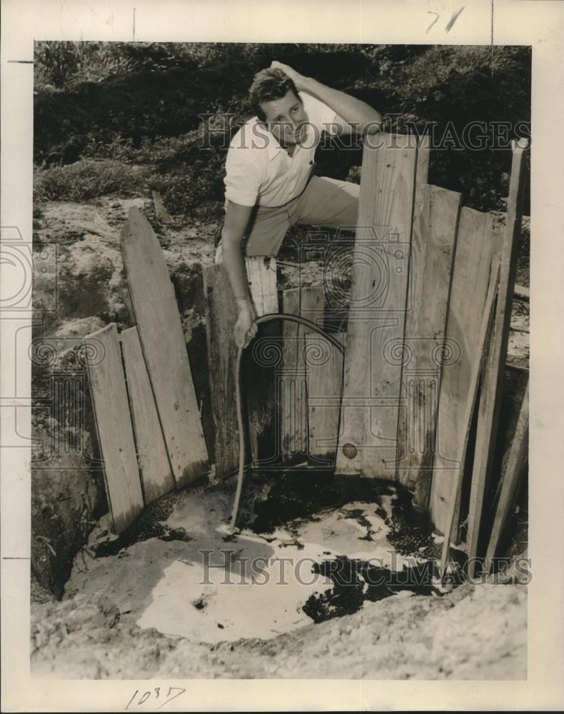 1955 Press Photo Lloyd Ducote After Garden Hose Construction Site Accident