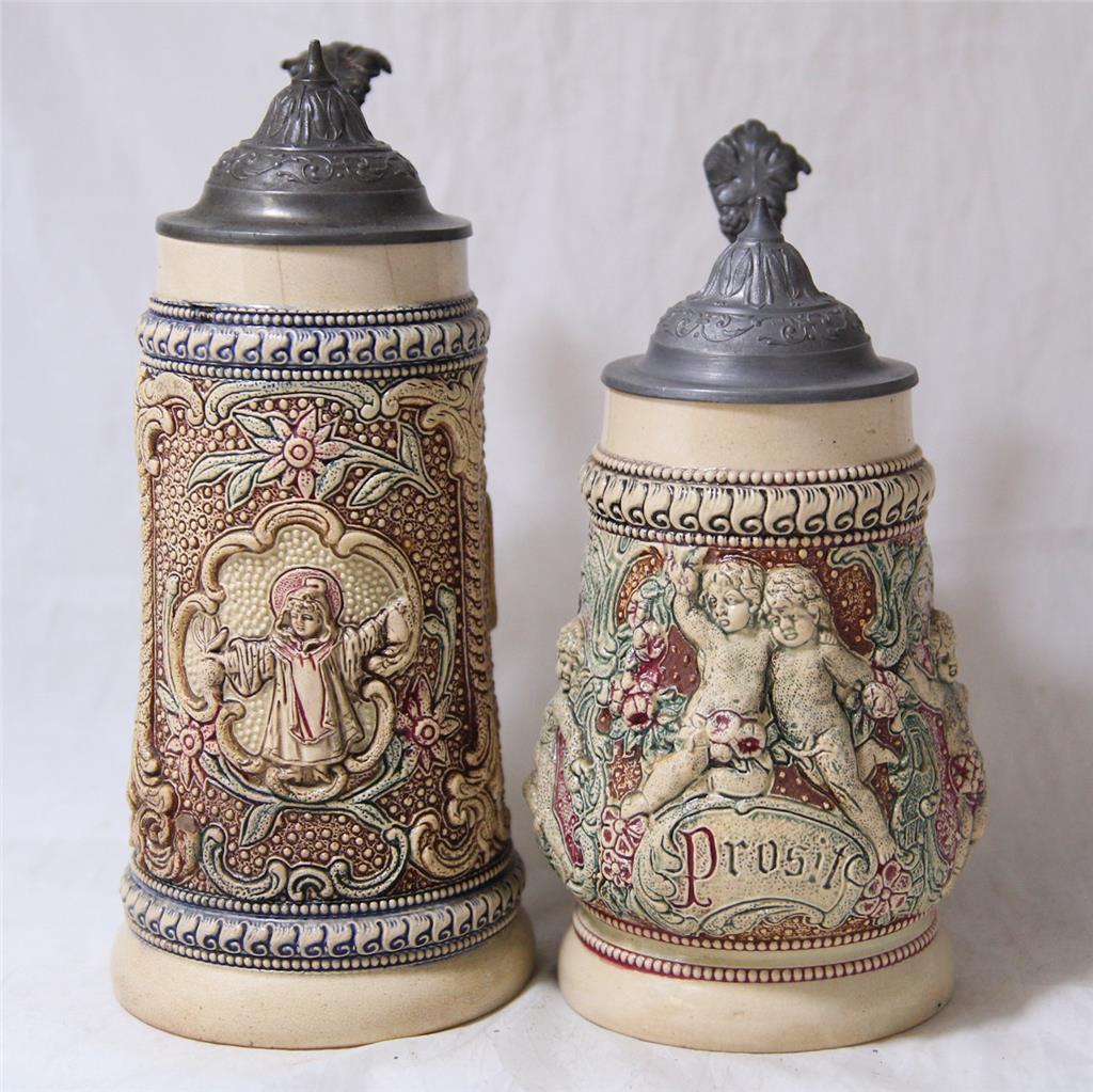 Two Antique German Beer Steins by A.Diesinger Cupids and Munich Child c.1900s