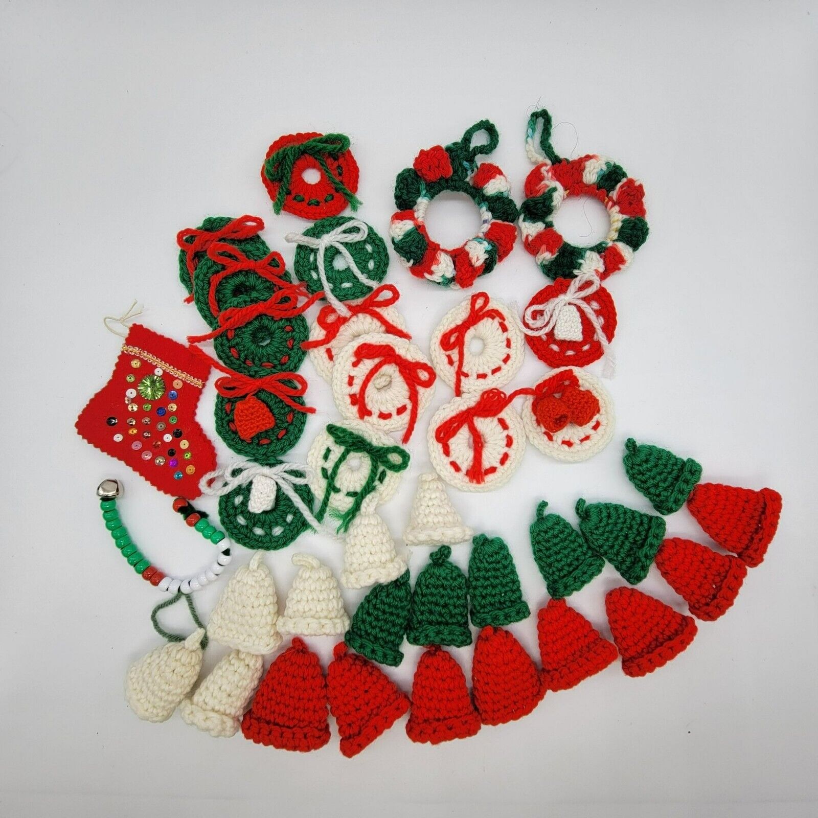 1970s Christmas 38 pc. Knitted Yarn Ornaments Bells Wreaths Red Green White