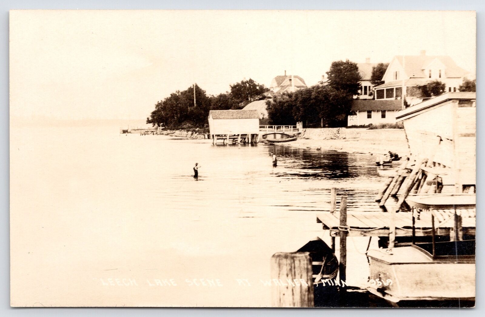 Walker MN Houseboat & Boathouse~Shore Homes on Leech Lake~Swimmers RPPC c1910