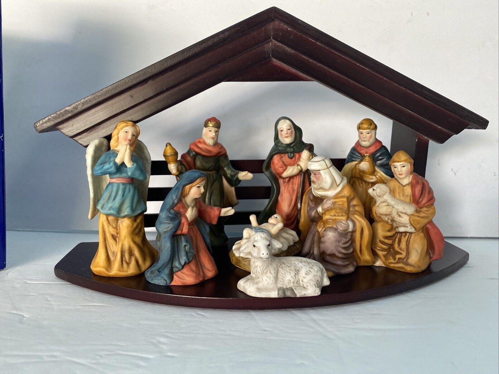 Painted Porcelain 10 Piece Nativity Set With Wooden Stable 10.5\