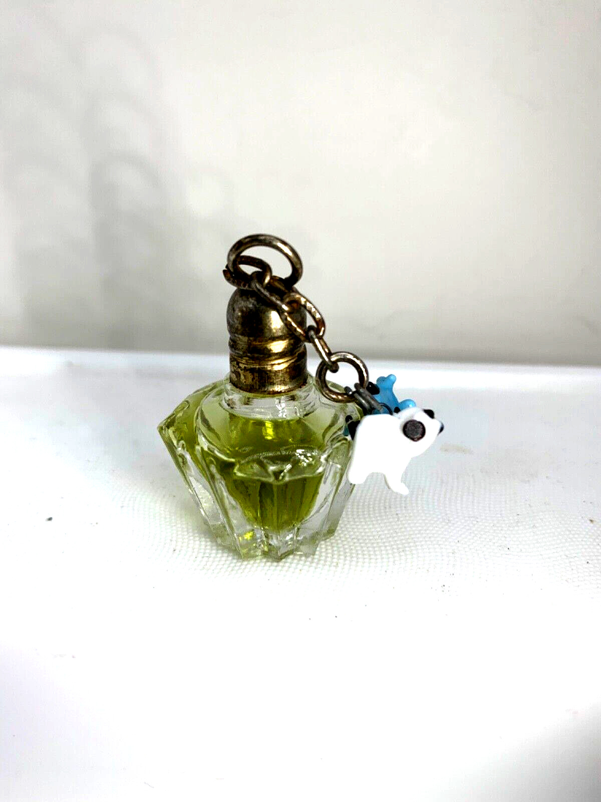 Darling  VTG Irice mini perfume bottle w/tiny glass dangling Dog charms.  1930s