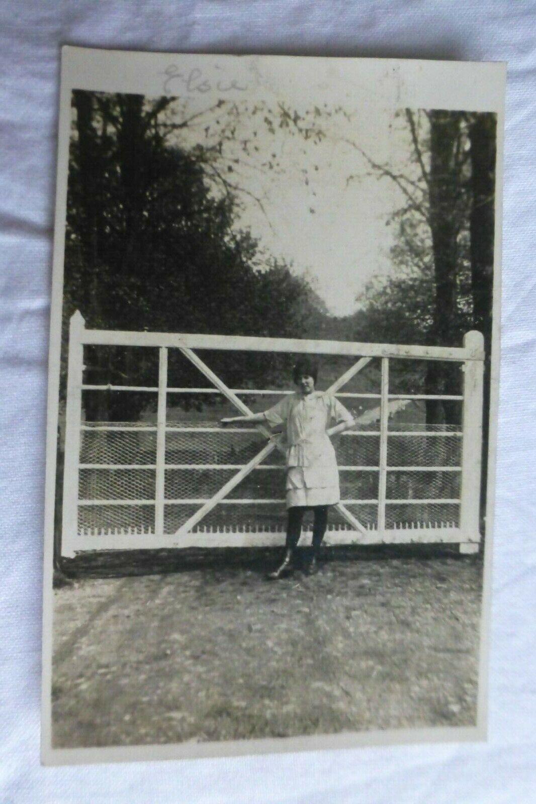 M602 Real Photo Woman \'Elsie\' Stood At GATE Postcard c1910s