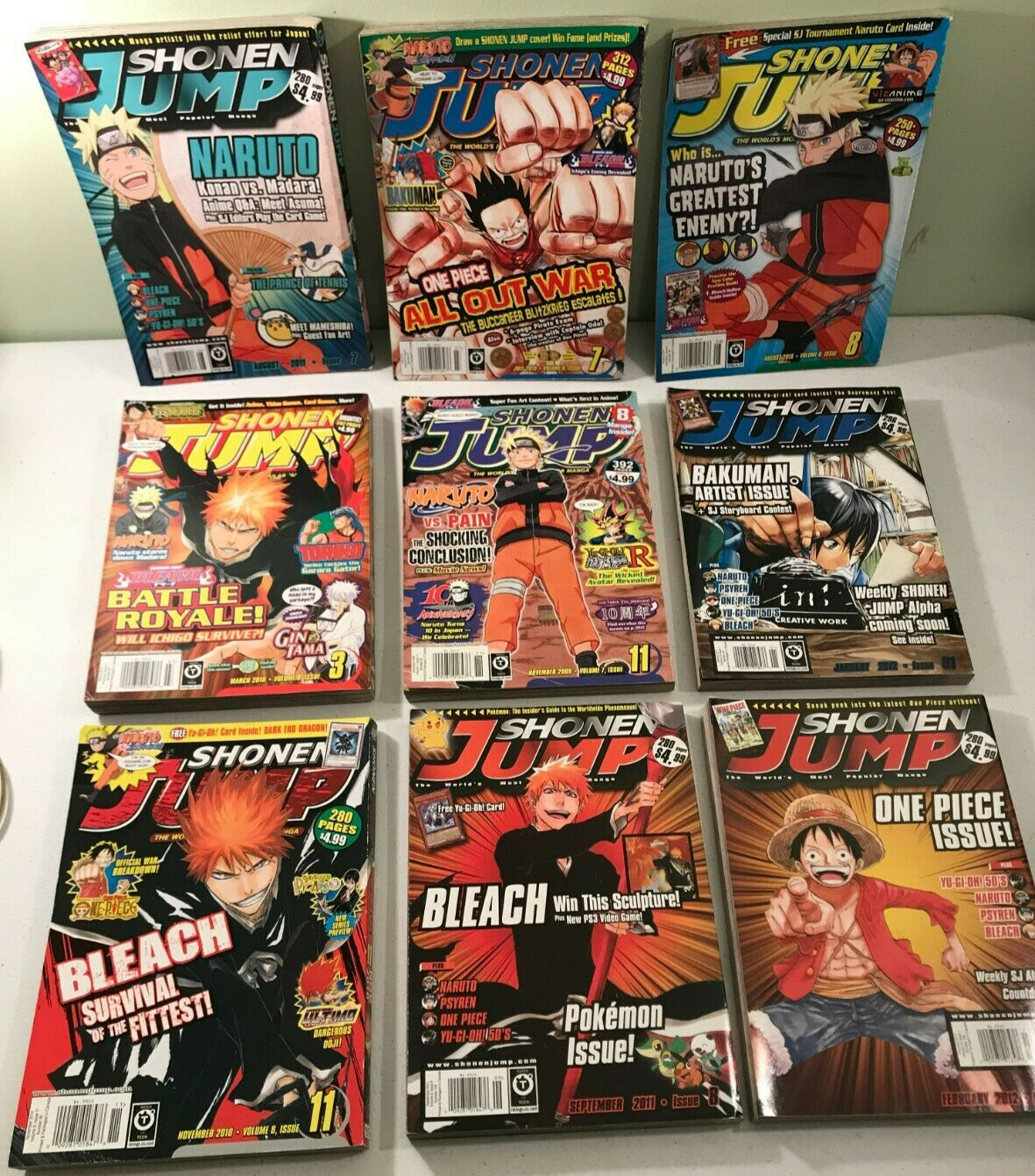 Lot 9 SHONEN JUMP Magazines 2009-2012 - Pre-owned, 1 issue still has card