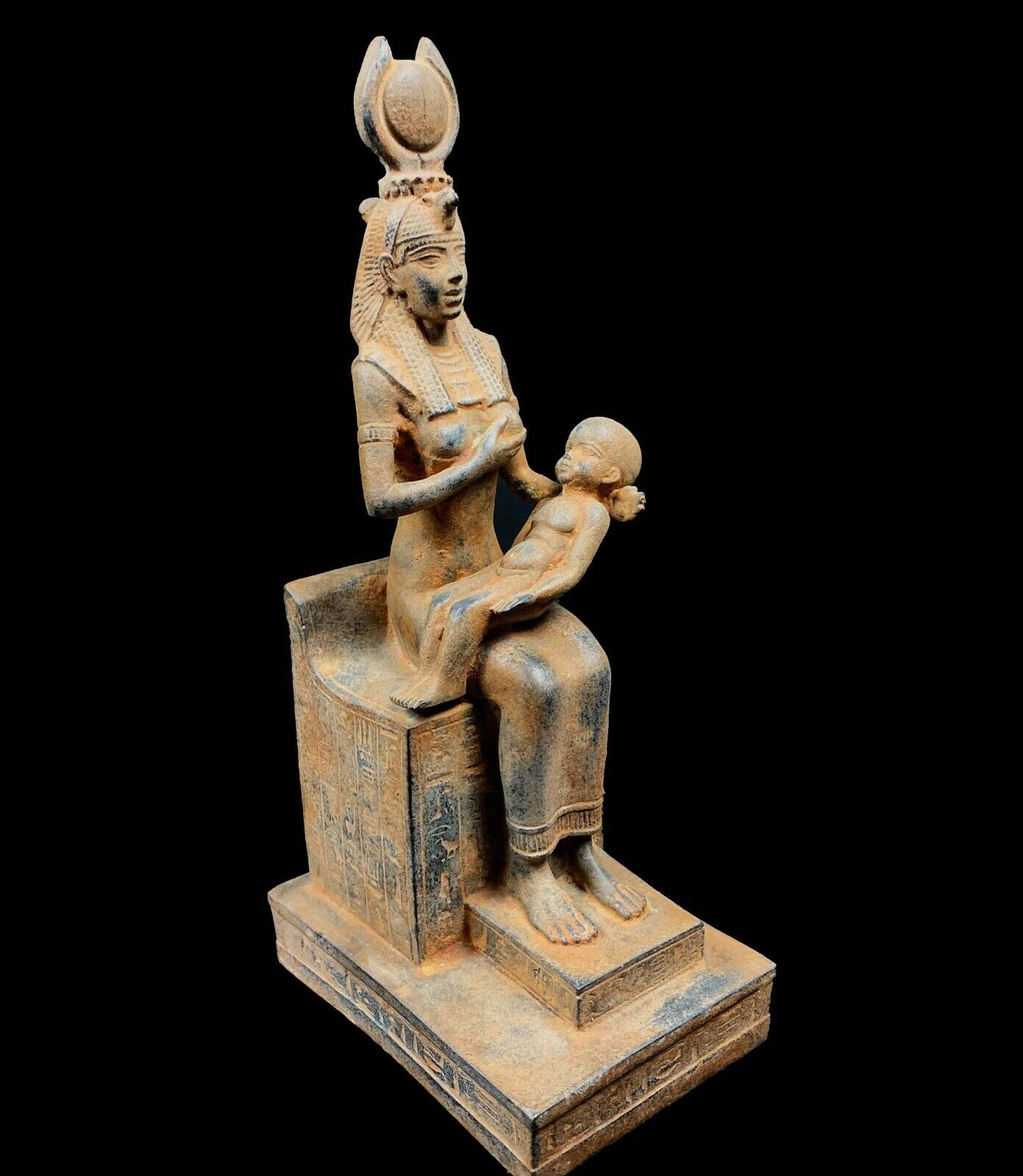 In a perfect scene ISIS Goddess of healing and magic Breastfeeding HORUS