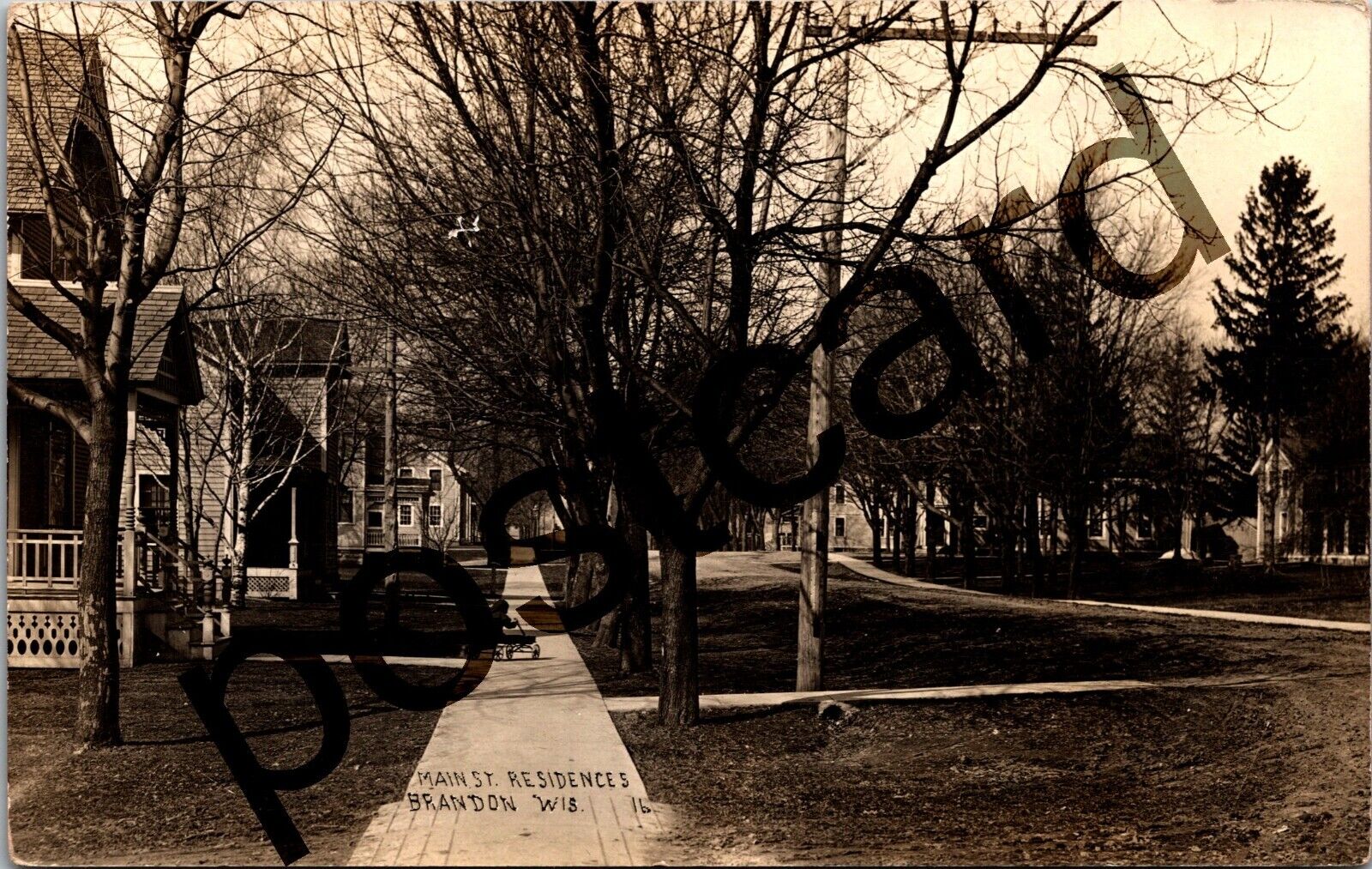 1910 BRANDON WI, Main St. Residences, boy on wagon, RPPC postcard jj249
