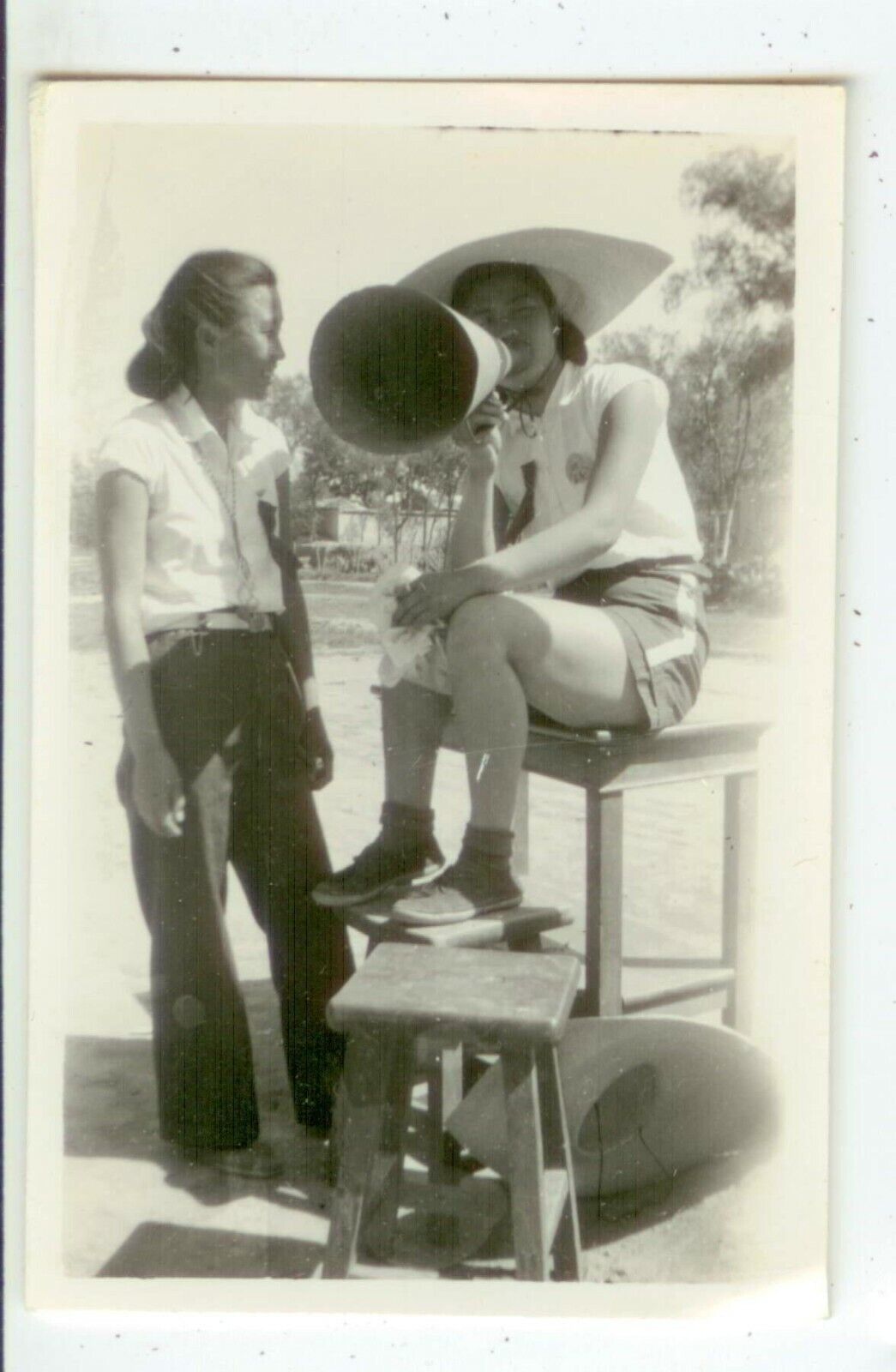 c1940s China photo from missionary collection - girl with megaphone sports event