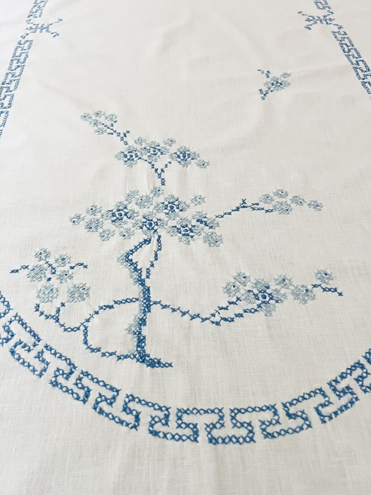 Large oval hand embroidered tablecloth blue & white,tree,blossoms, Greek Key