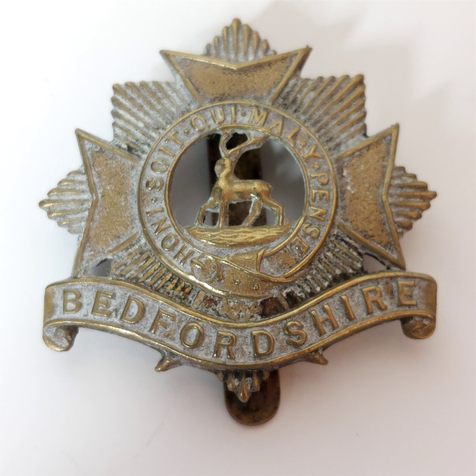 Bedfordshire Regiment Cap Badge Brass Slider Voided 41mm