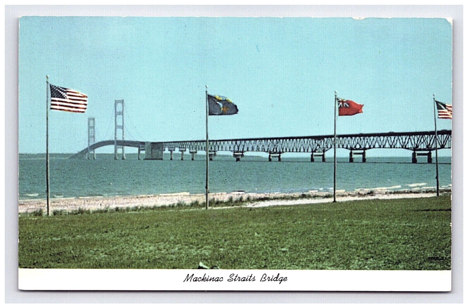 Postcard MI Mackinac Straits Suspension Bridge Flags Water Scenic View Michigan 