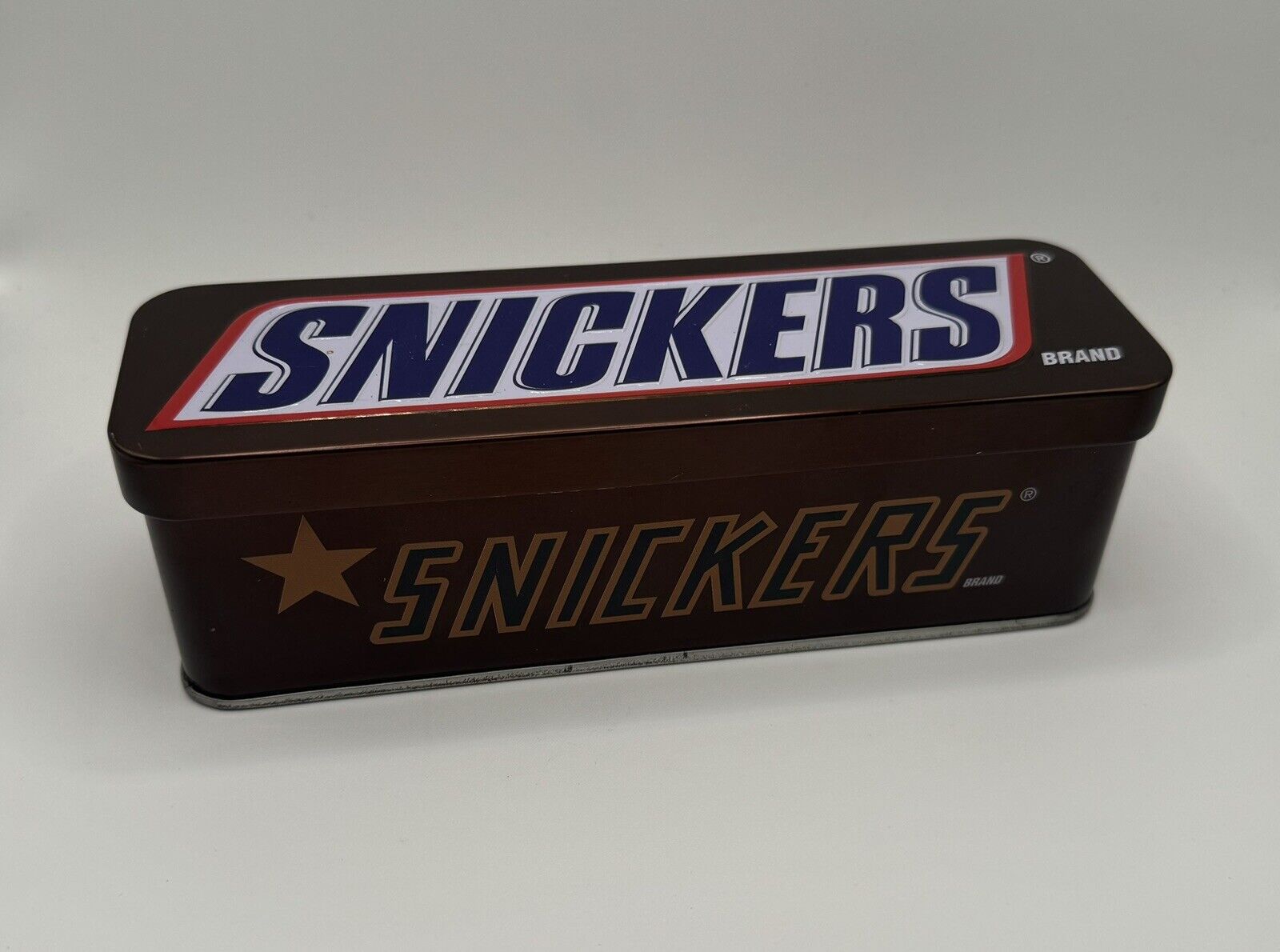 Empty Snickers Candy Tin Can