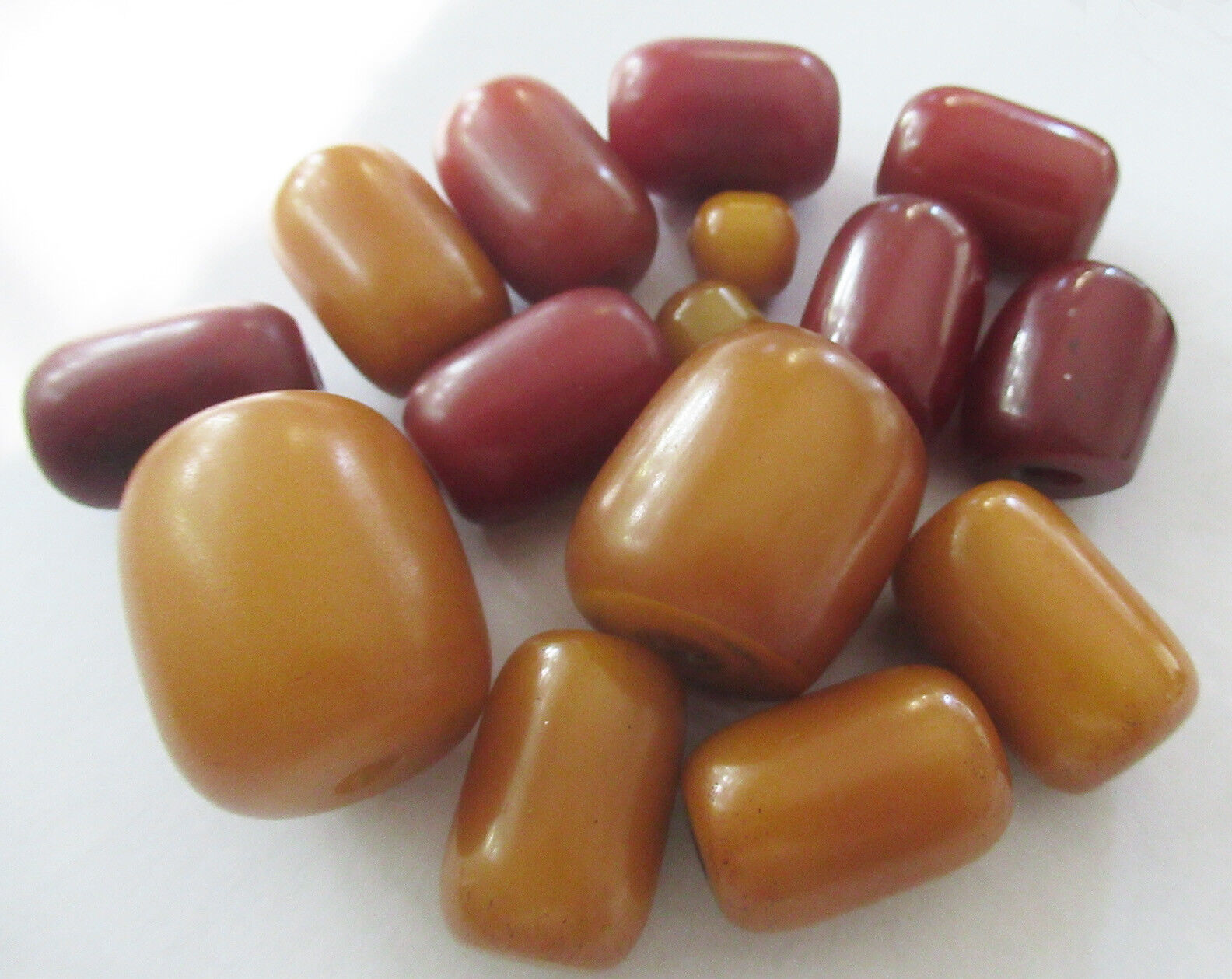 15 VINTAGE BAKELITE BEADS - 72 GRAMS - 1.10 by .945 INCHES, .91 BY .63 INCHES