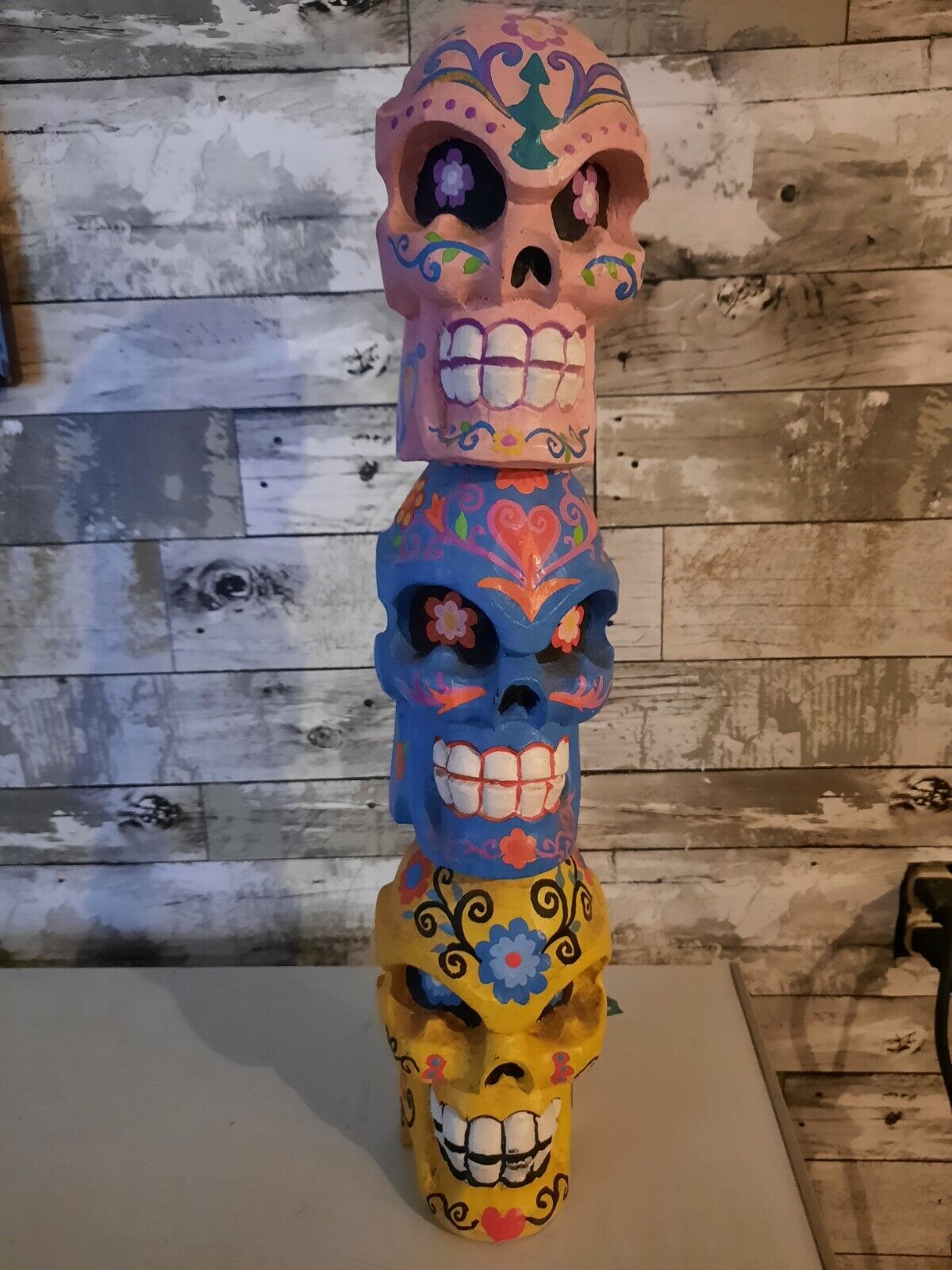Three Colorful Stacked Skulls