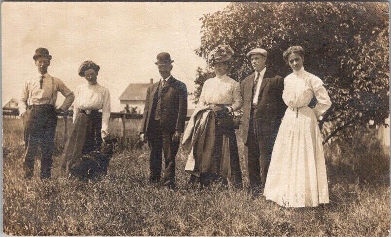 1911 GLOVER, North Dakota Photo RPPC Postcard Family in Field / Outdoor Portrait