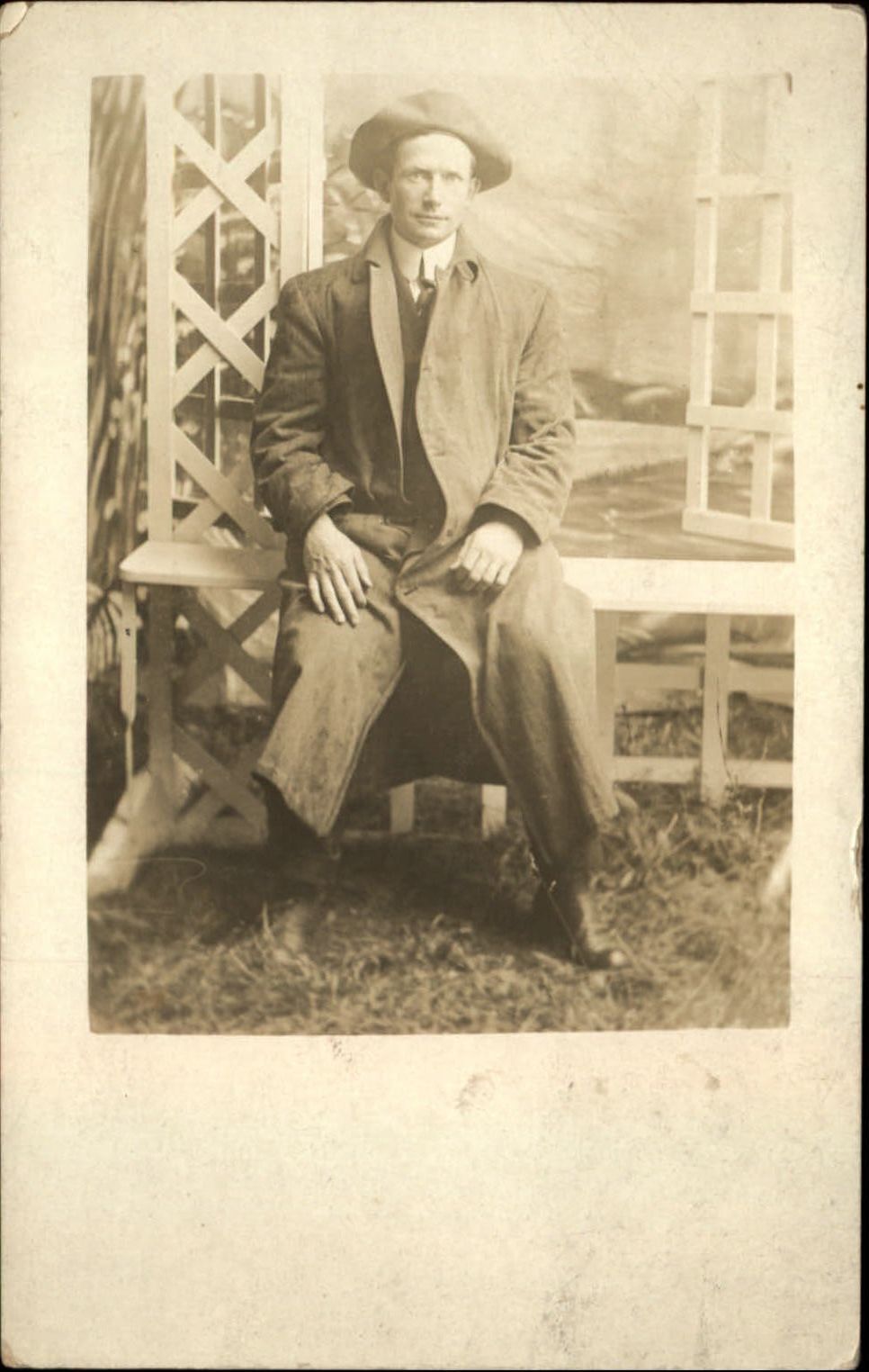 RPPC Edwardian man overcoat jaunty hat gazebo bench 1904-18 real photo PC