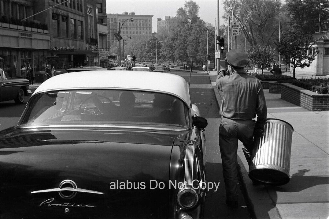 1960\'s NEGATIVE Street View w Trash Man Directing Couple in Pontiac Car Boston