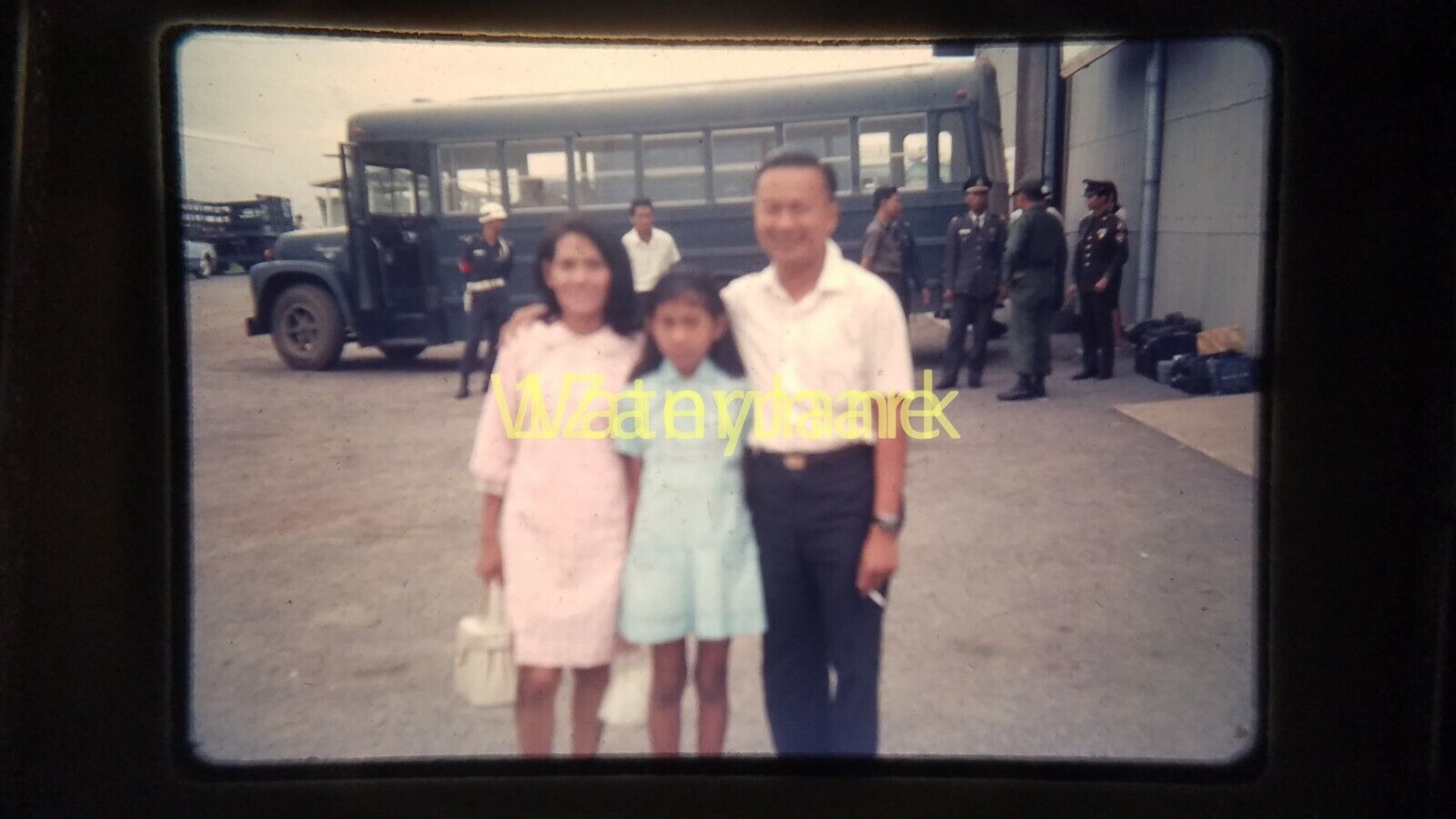 XXFV02 Vintage 35MM SLIDE FAMILY OF 3 WITH SOLDIERS AND MILITARY BUS IN BKGD
