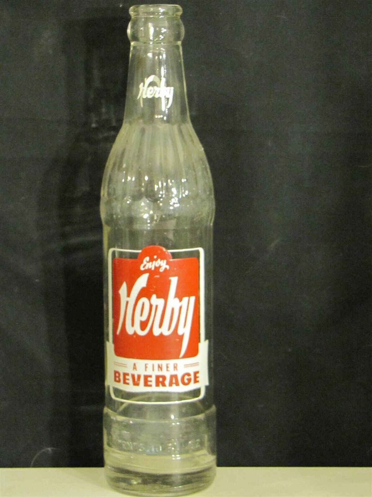 Herby Beverage (Red Label) ACL Soda Bottle  10oz  1950 Leavenworth, KANS.