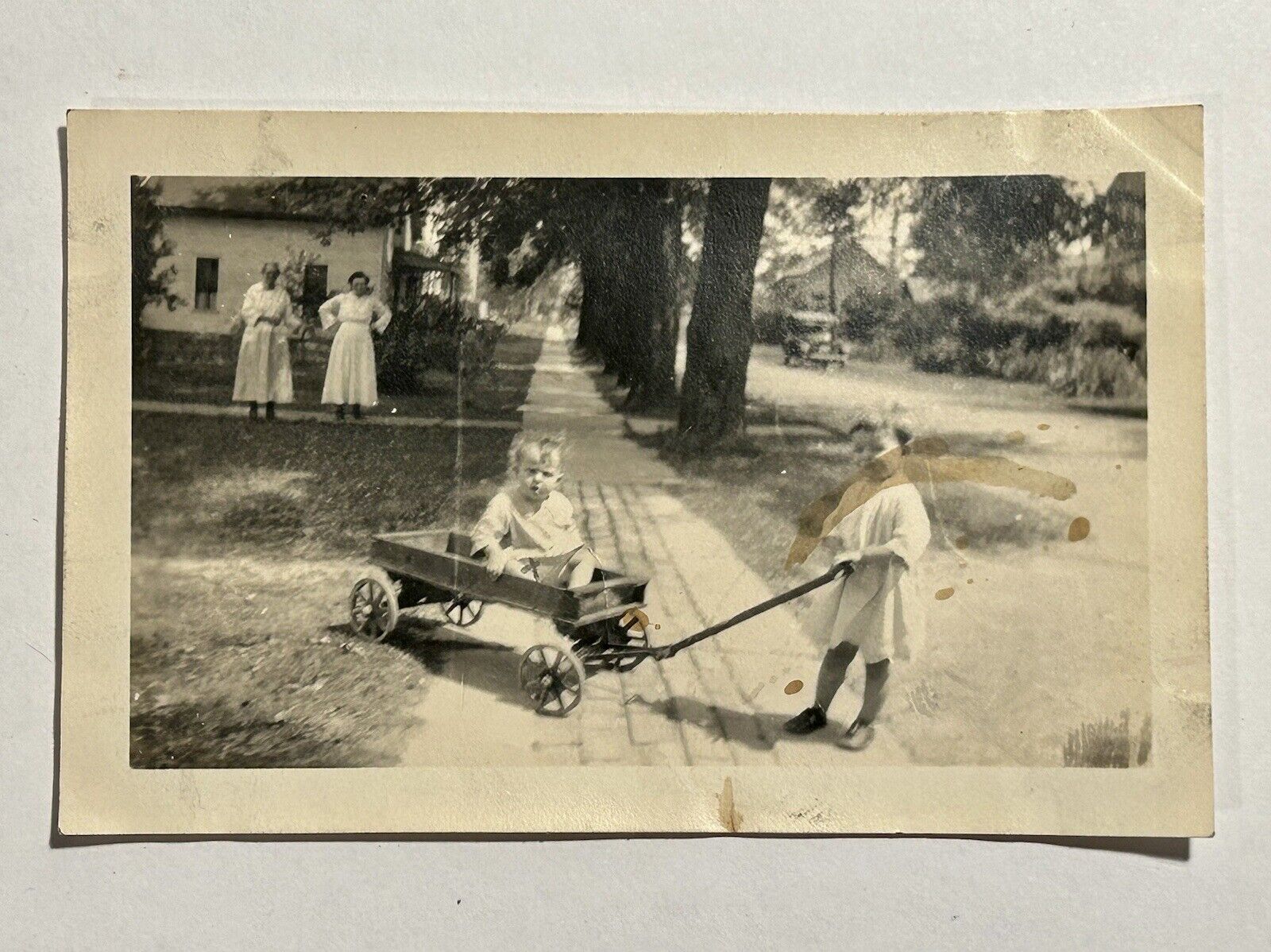Antique Photo Boy in Wagon Pulled By Another Boy Mothers Looking Displeased