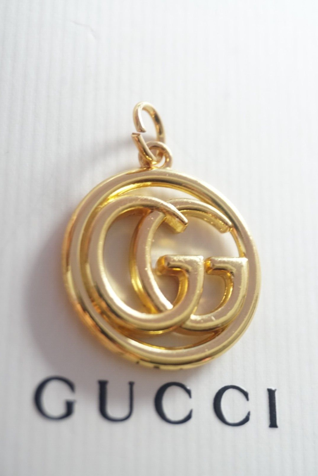 Gucci  Pendant 1 inch logo GG  Double Sided