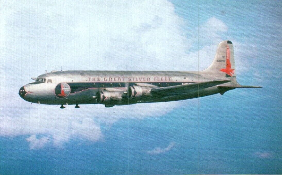 Postcard - Eastern Airlines Douglas DC-4 in flight over Miami in 1947  0279