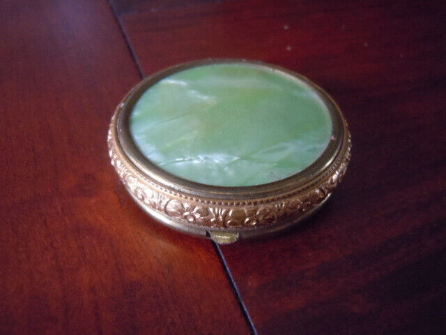 Vintage tiny pearly green rouge compact