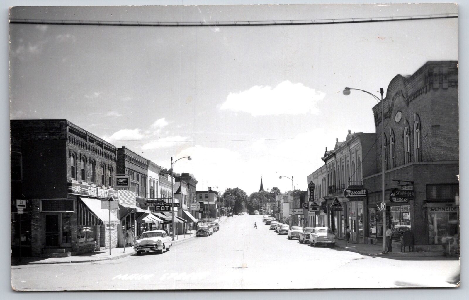 Horicon Wisconsin~Main Street~Rexall Drugs~Schneider Dry Goods~1950s Cars RPPC