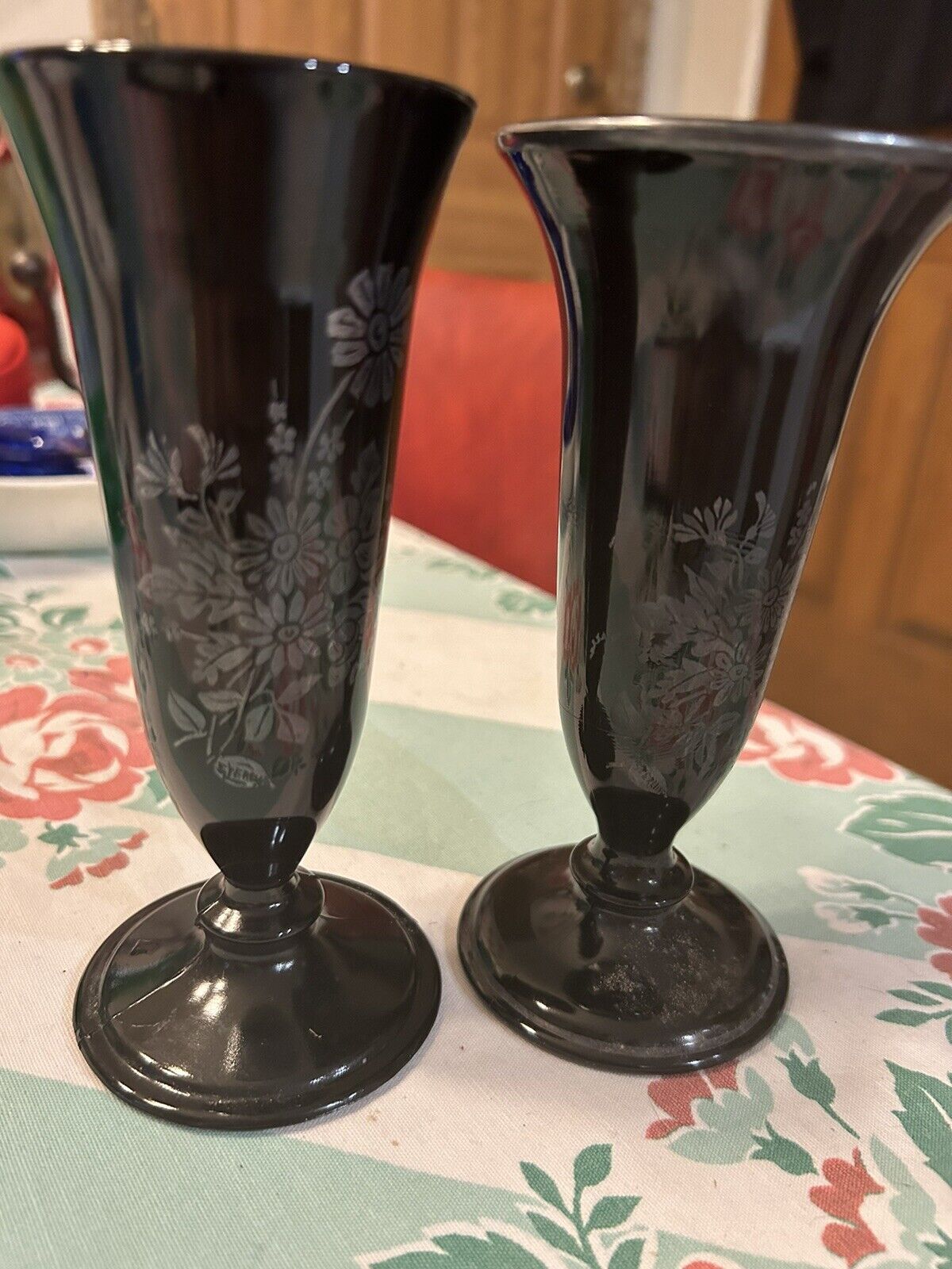 Two Black Glass Floral Pattern Vases