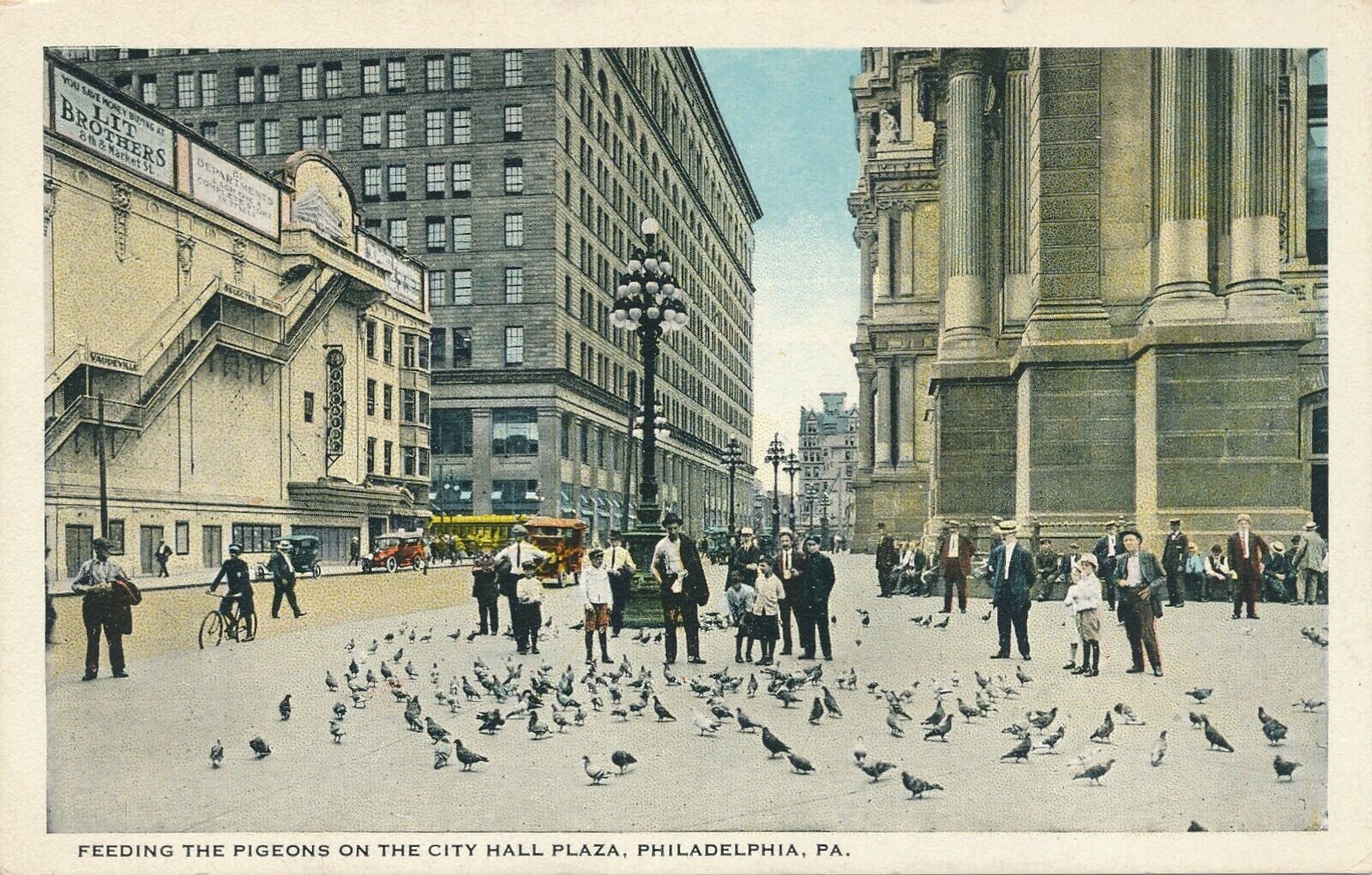 PHILADELPHIA PA – Feeding the Pigeons On the City Hall Plaza